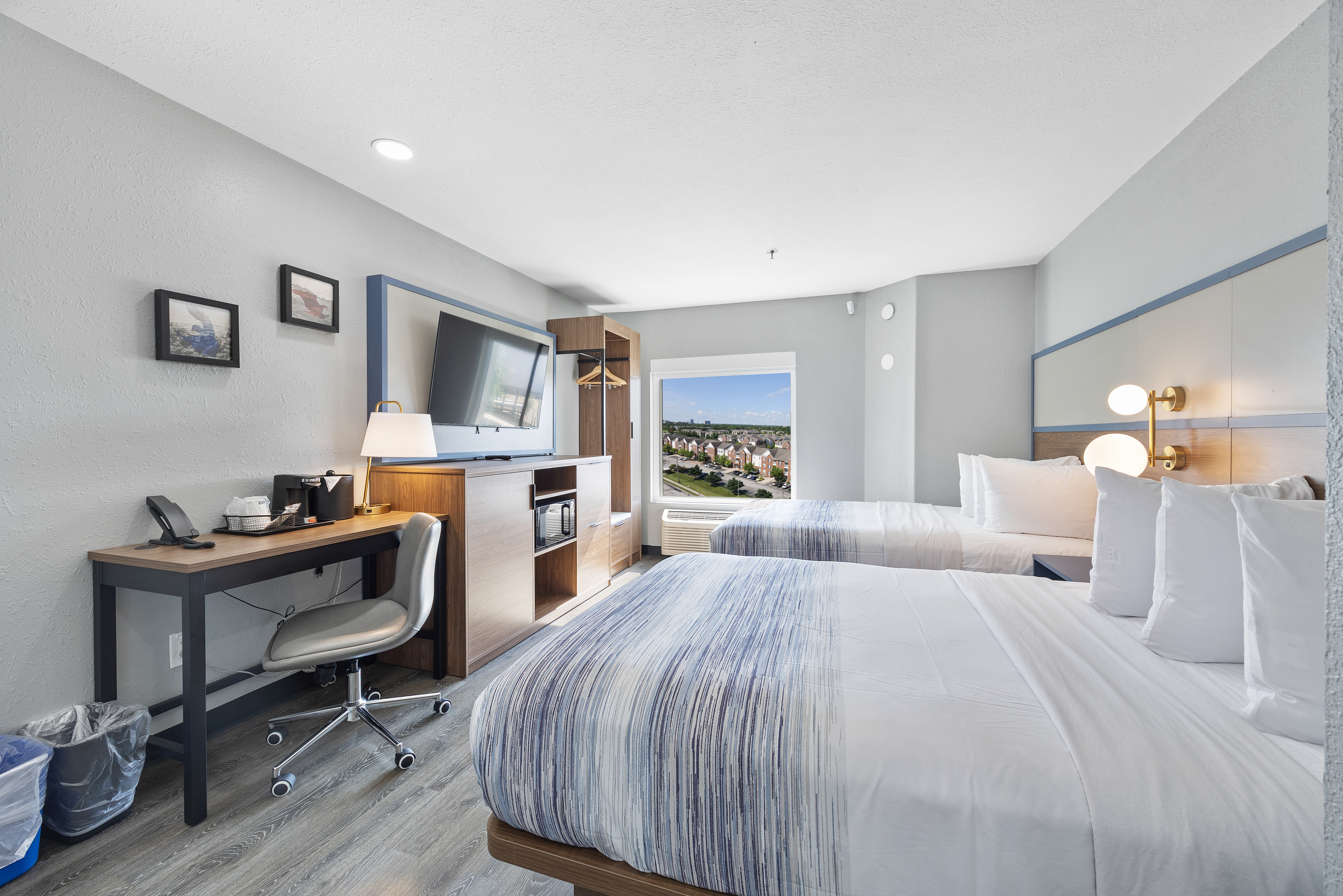 Guest room at the AmericInn by Wyndham Urbana/Champaign University Area in Urbana, Illinois