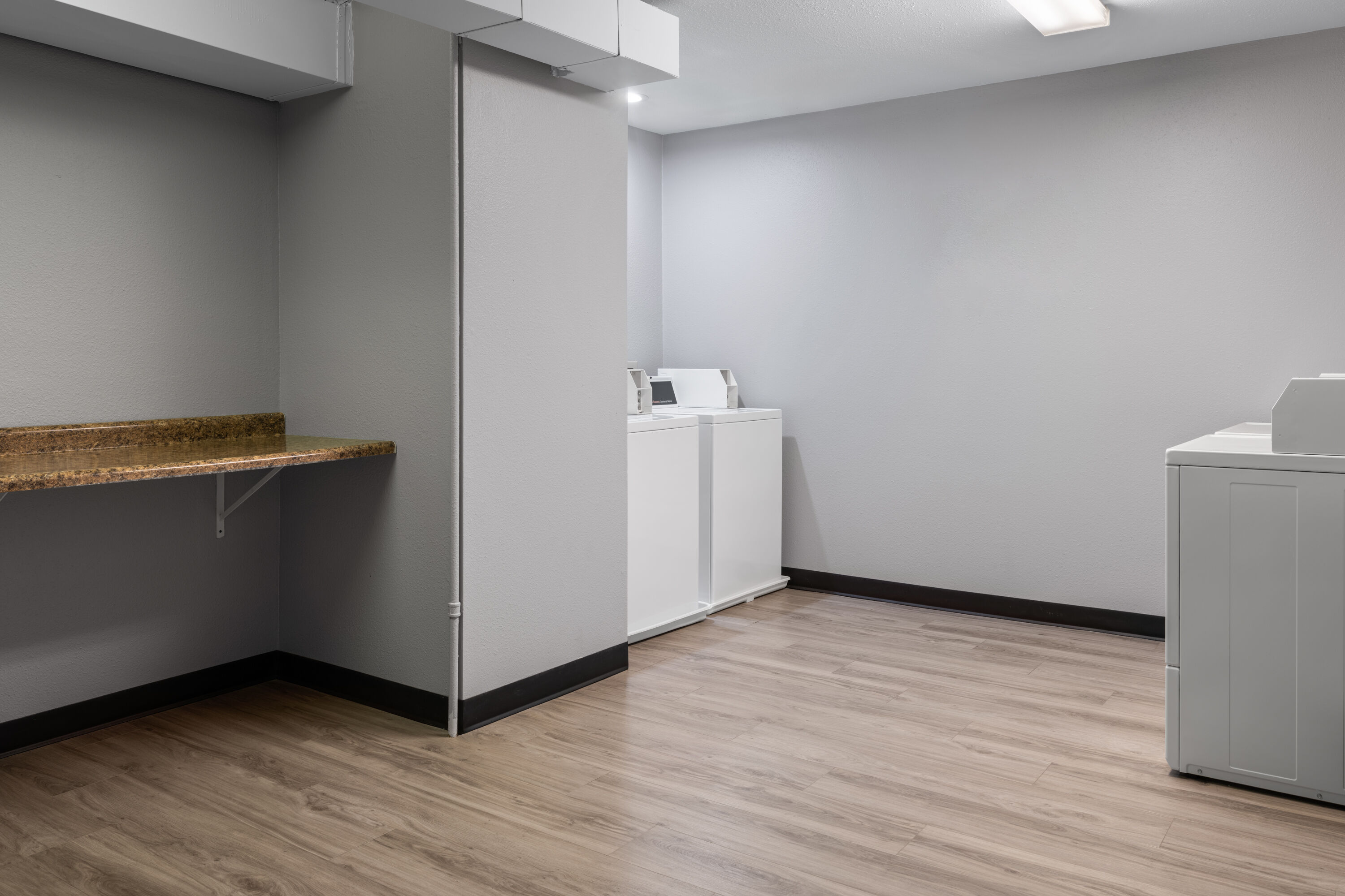 Laundry facilities at AmericInn by Wyndham Urbana/Champaign University Area in Urbana, Illinois