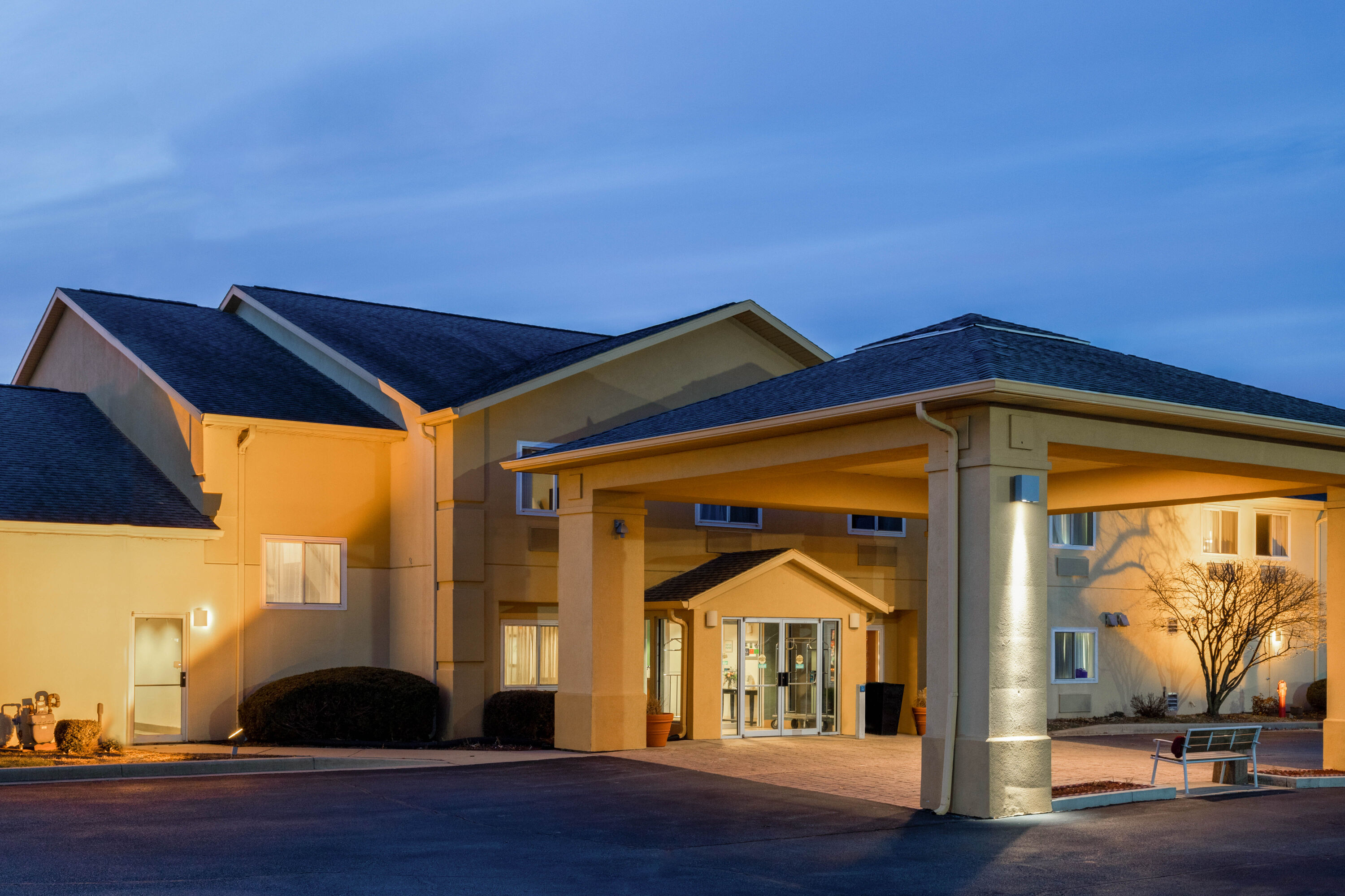 Exterior Dusk Image of AmericInn by Wyndham Frankfort IN hotel in Frankfort, Indiana