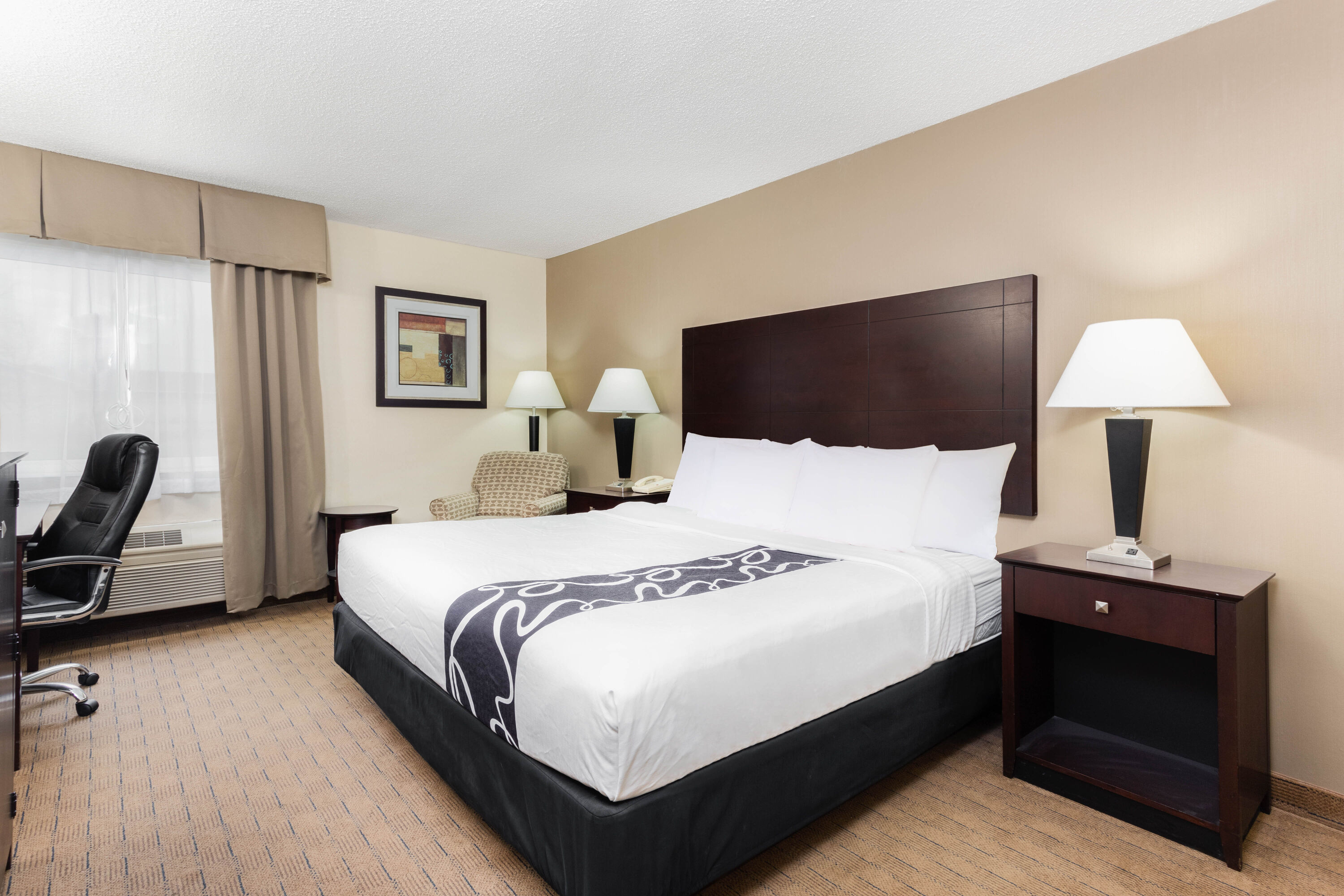 Guest room at the AmericInn by Wyndham Frankfort IN in Frankfort, Indiana