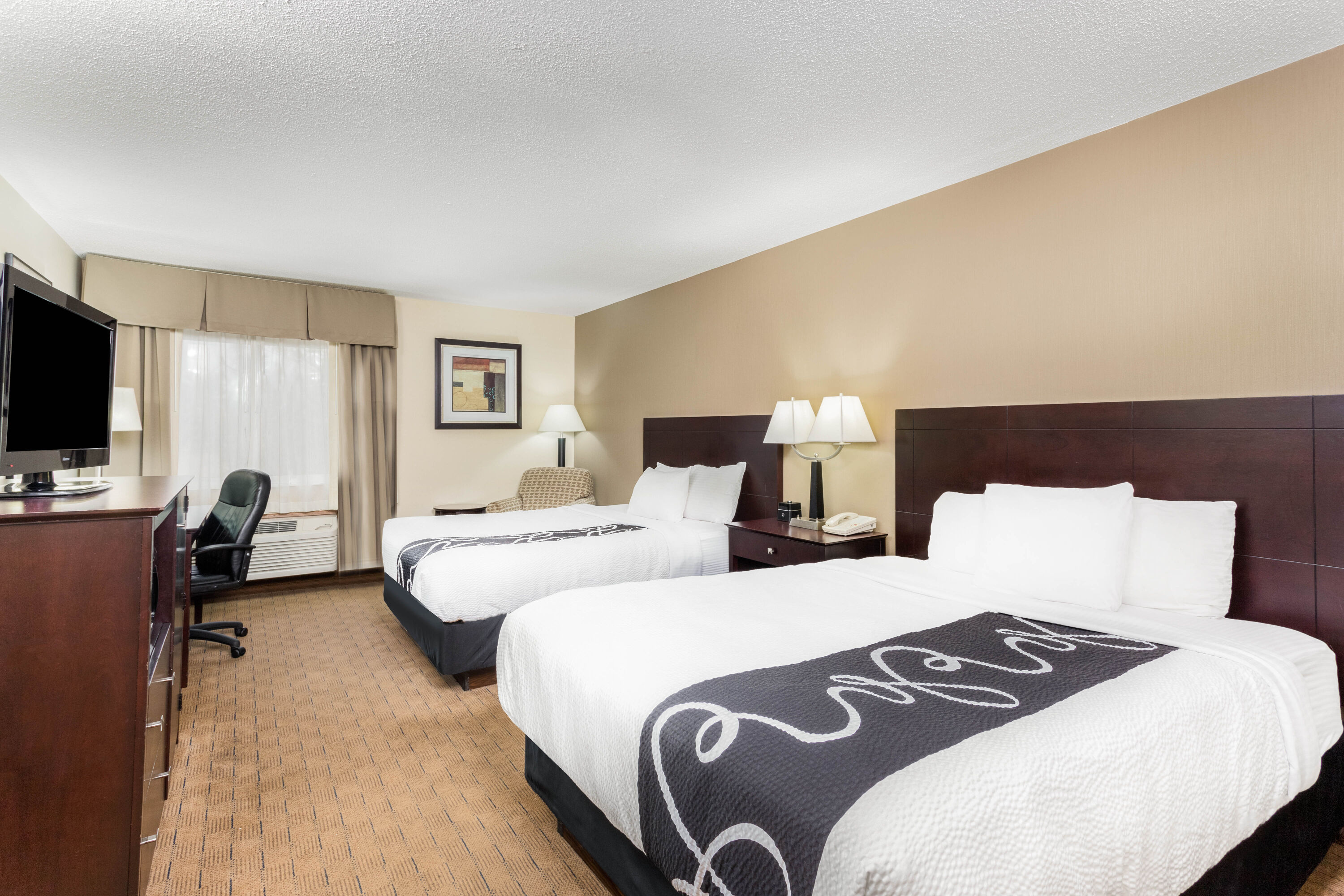 Guest room at the AmericInn by Wyndham Frankfort IN in Frankfort, Indiana