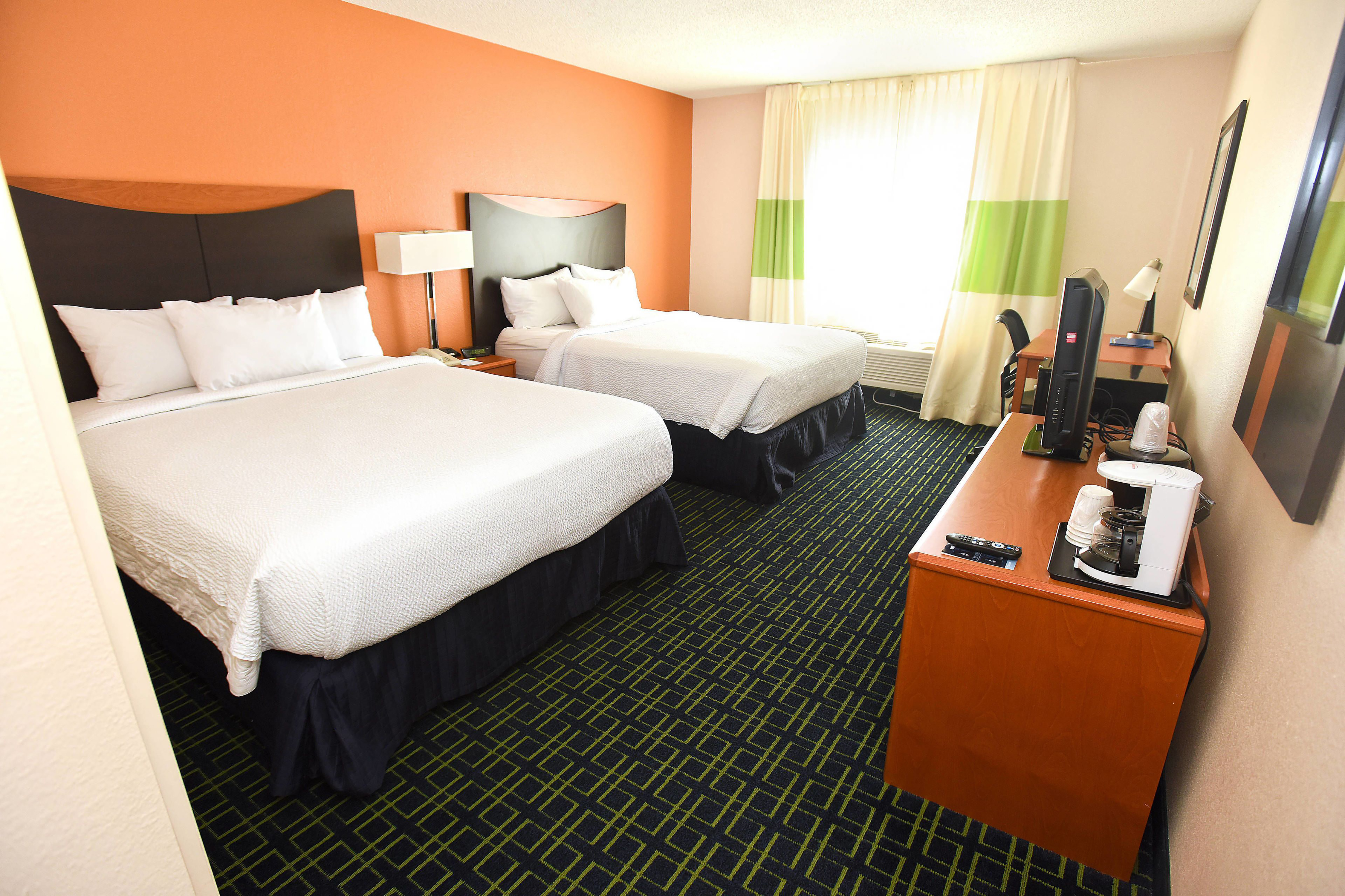 Guest room at the AmericInn by Wyndham Topeka in Topeka, Kansas