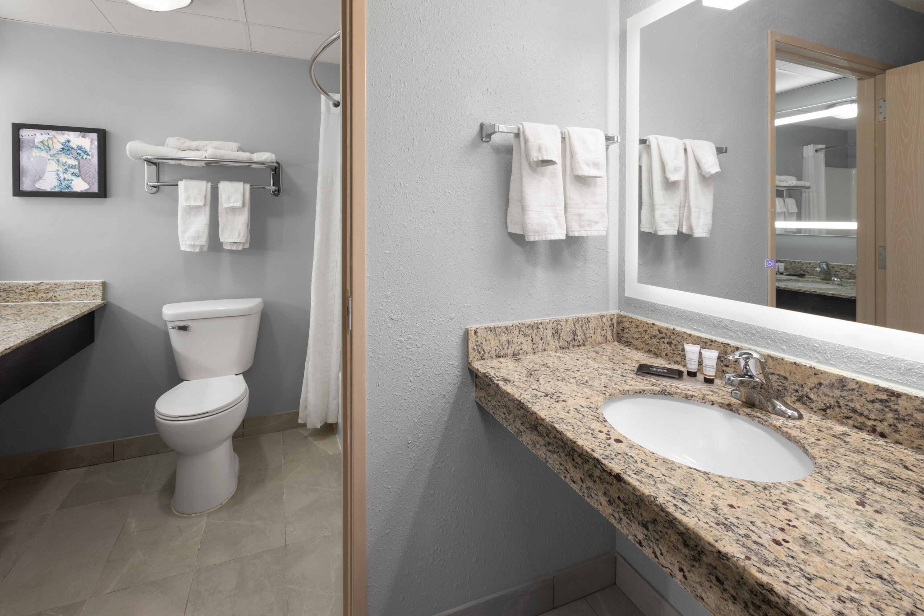 Guest room bath at the AmericInn by Wyndham Douglas/Saugatuck in Douglas, Michigan