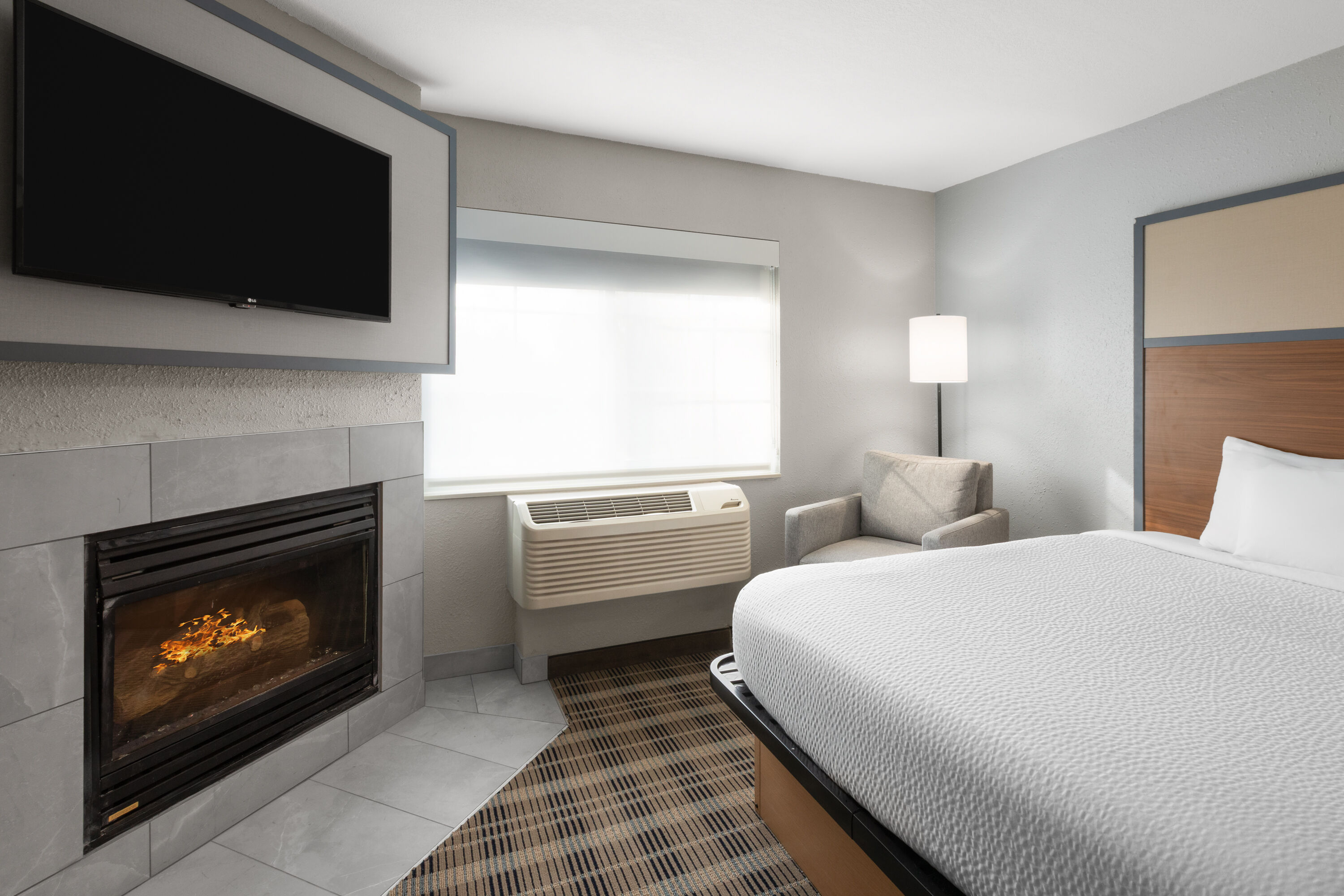 Guest room at the AmericInn by Wyndham Douglas/Saugatuck in Douglas, Michigan