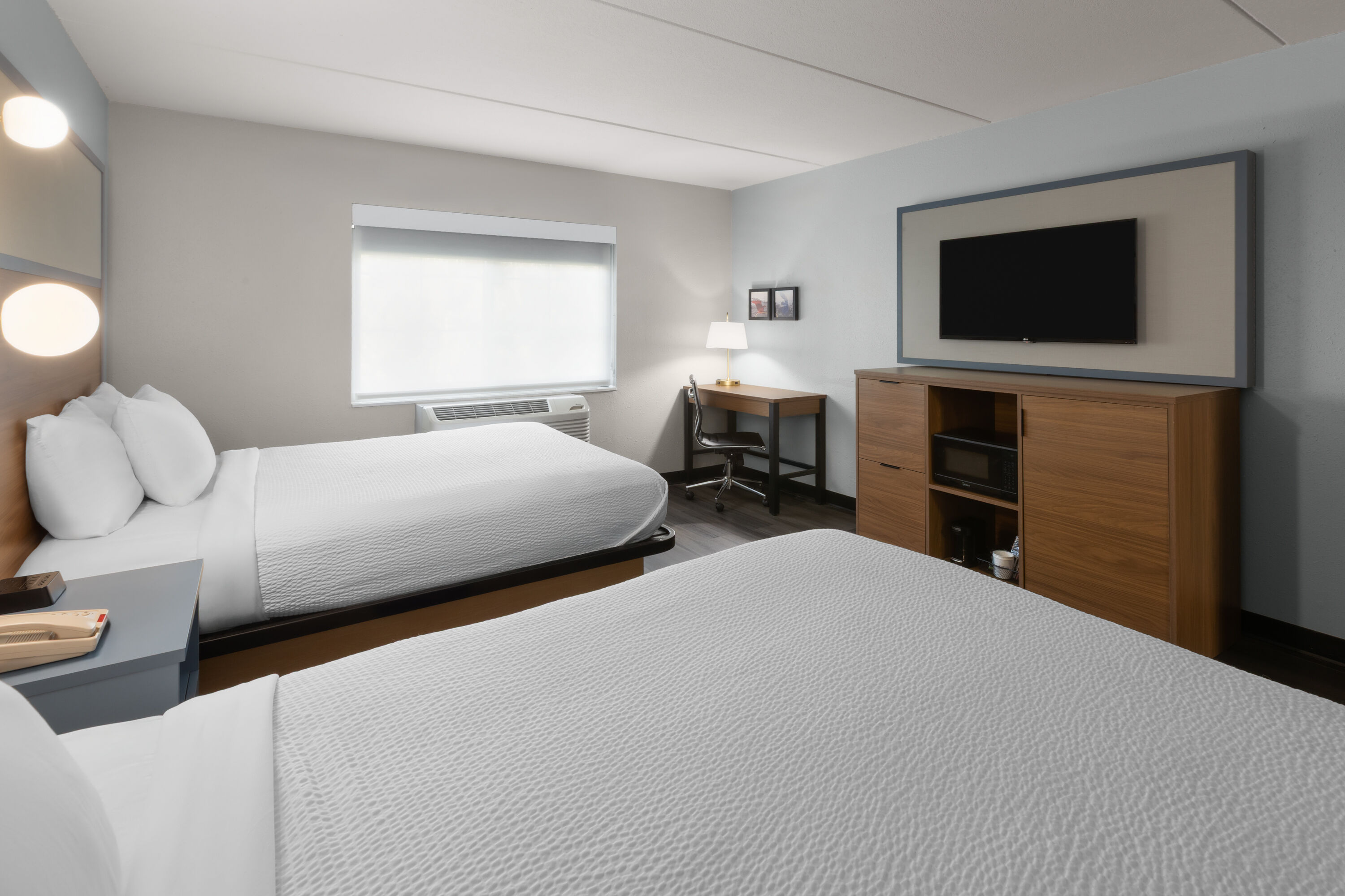 Guest room at the AmericInn by Wyndham Douglas/Saugatuck in Douglas, Michigan