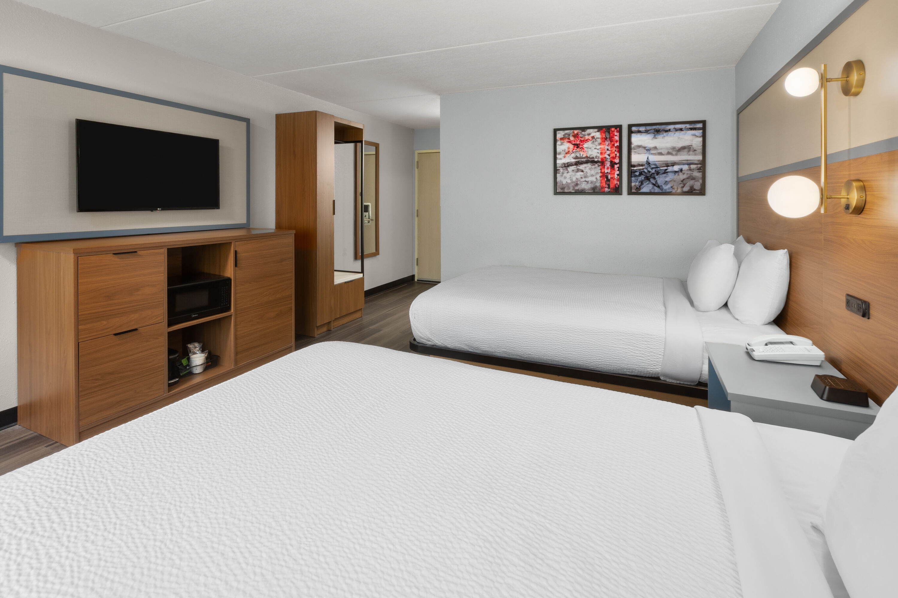 Guest room at the AmericInn by Wyndham Douglas/Saugatuck in Douglas, Michigan