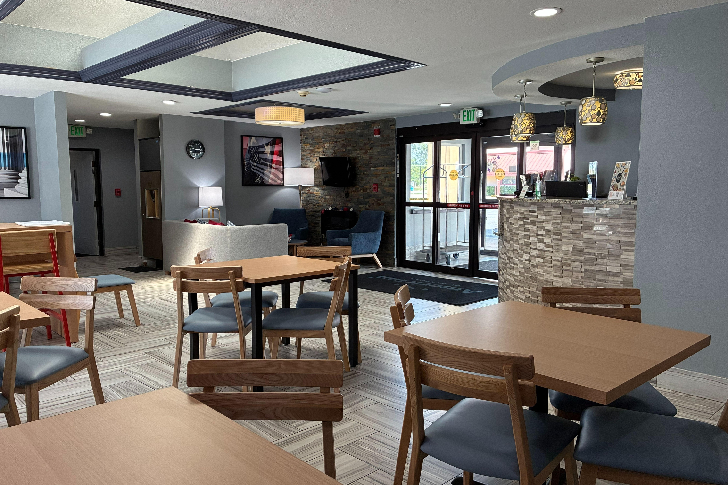 AmericInn by Wyndham Holland MI restaurant breakfast area with seating in Holland, Michigan