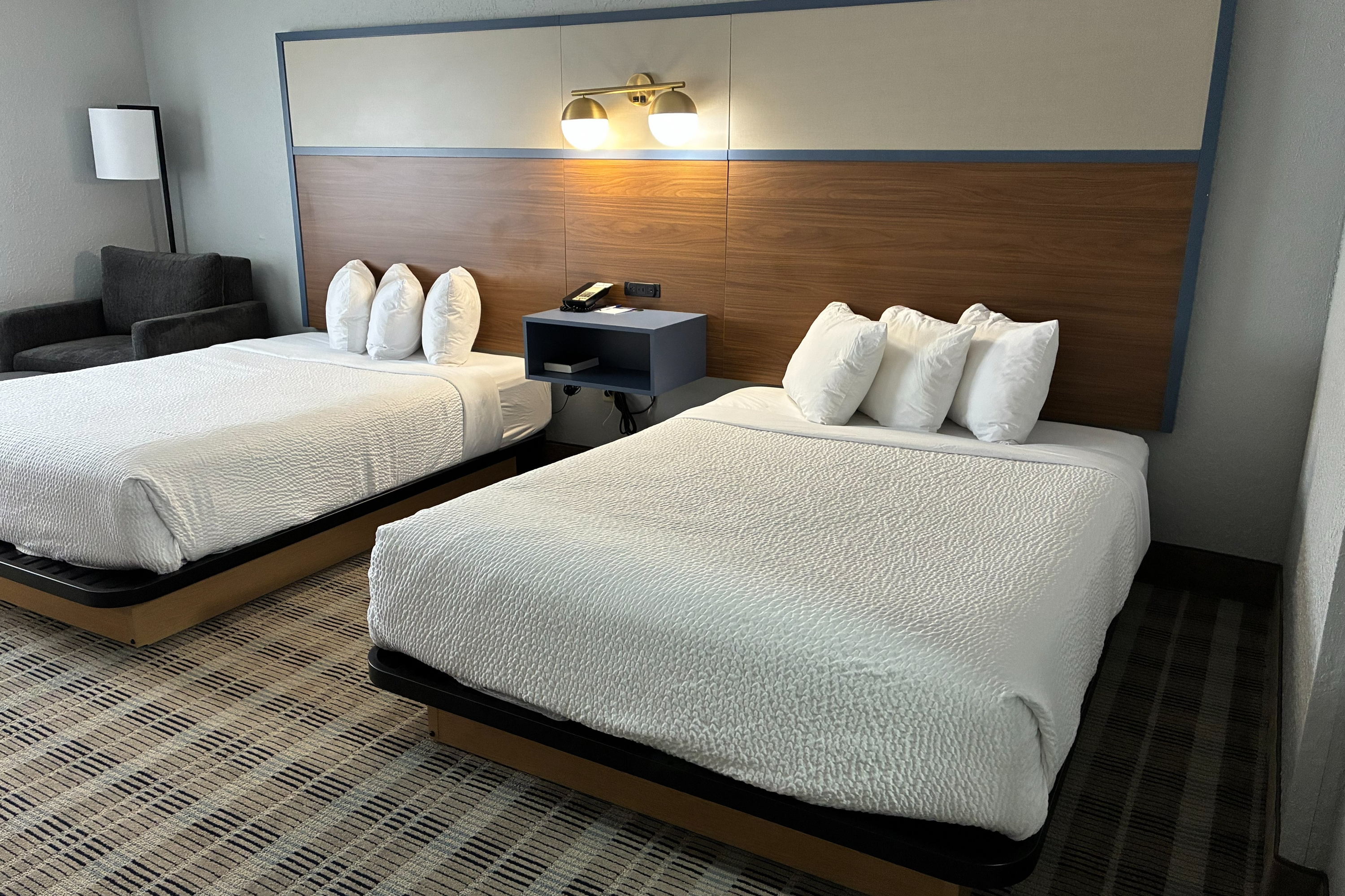 Guest room at the AmericInn by Wyndham Holland MI in Holland, Michigan