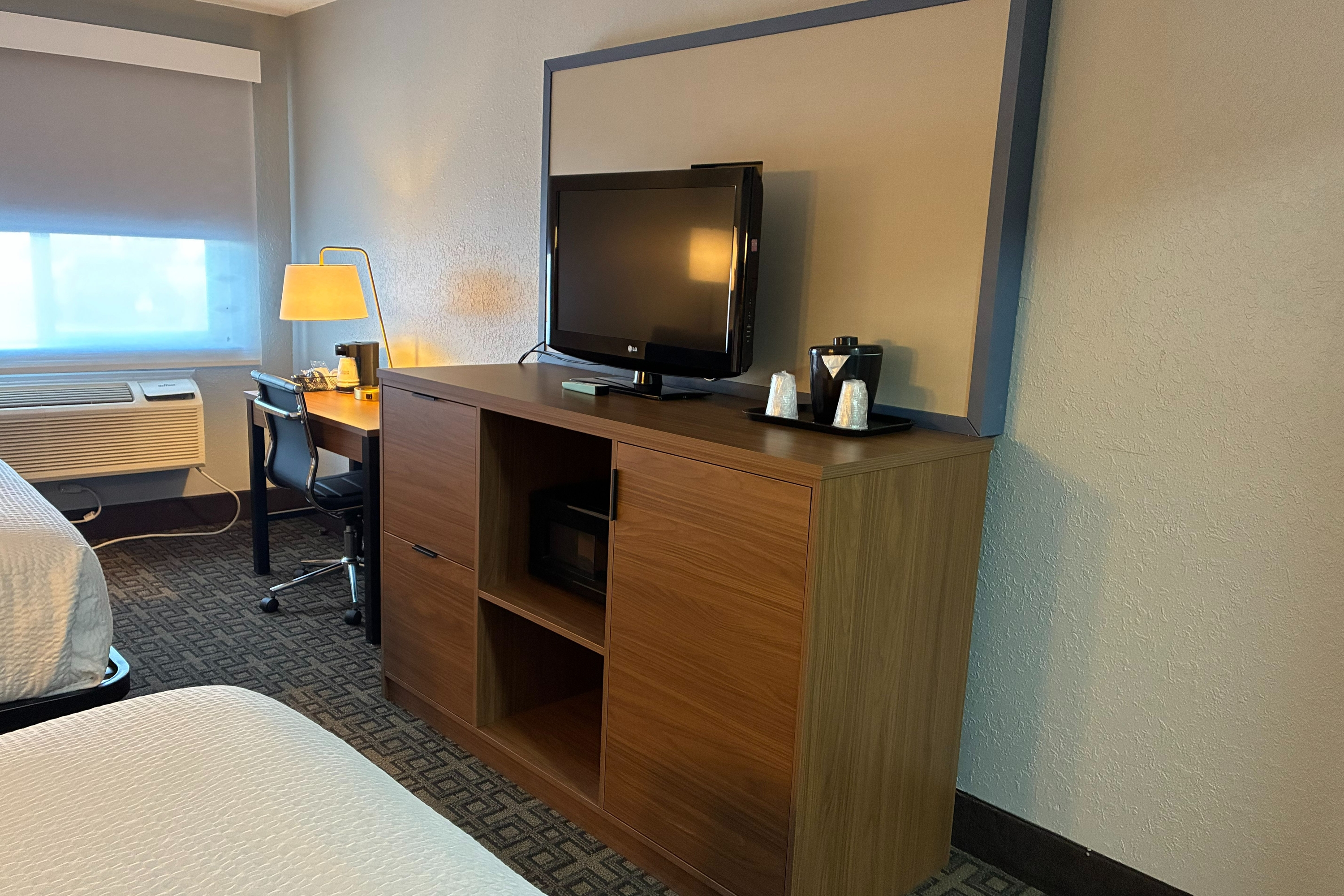 Guest room at the AmericInn by Wyndham Holland MI in Holland, Michigan