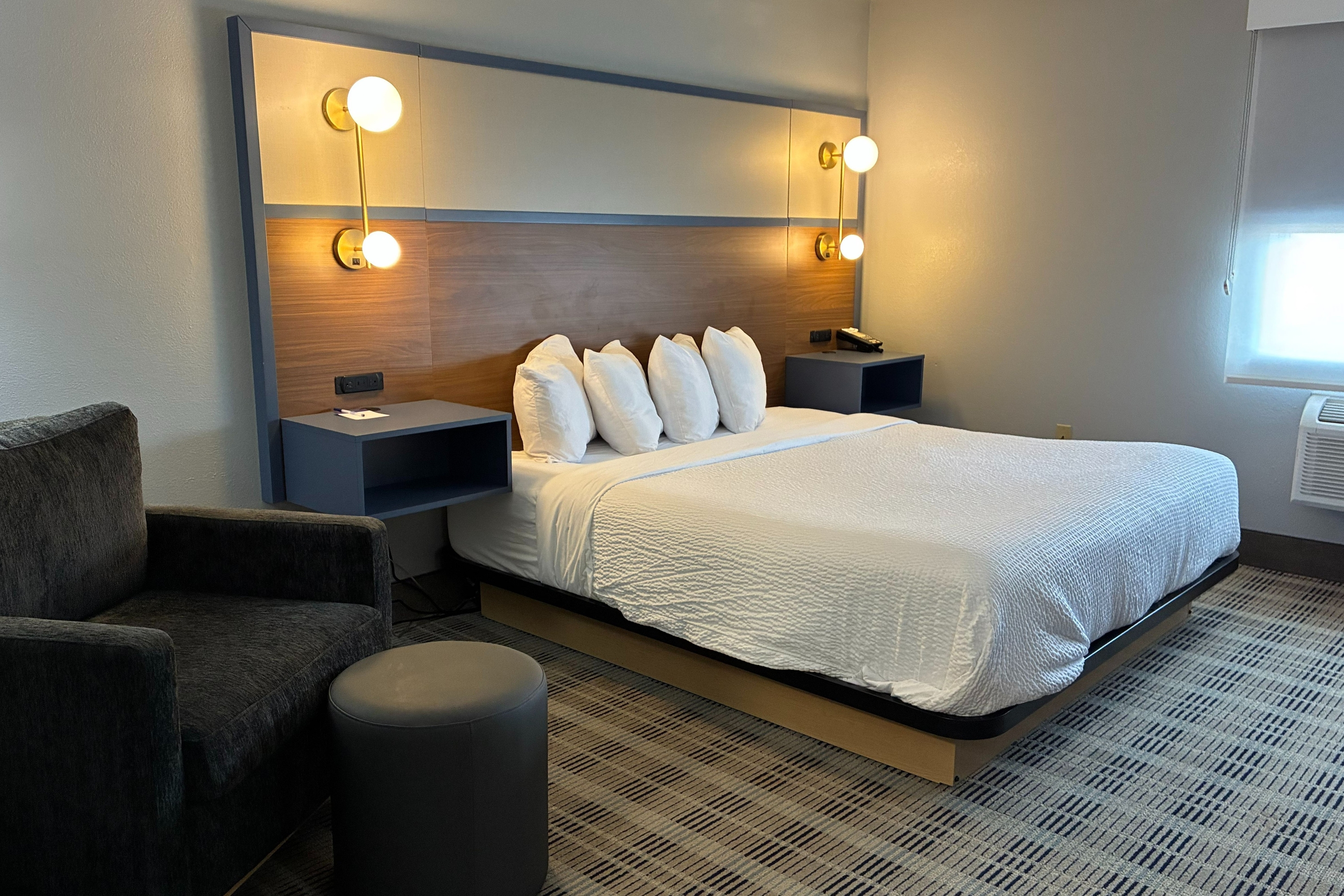 Guest room at the AmericInn by Wyndham Holland MI in Holland, Michigan