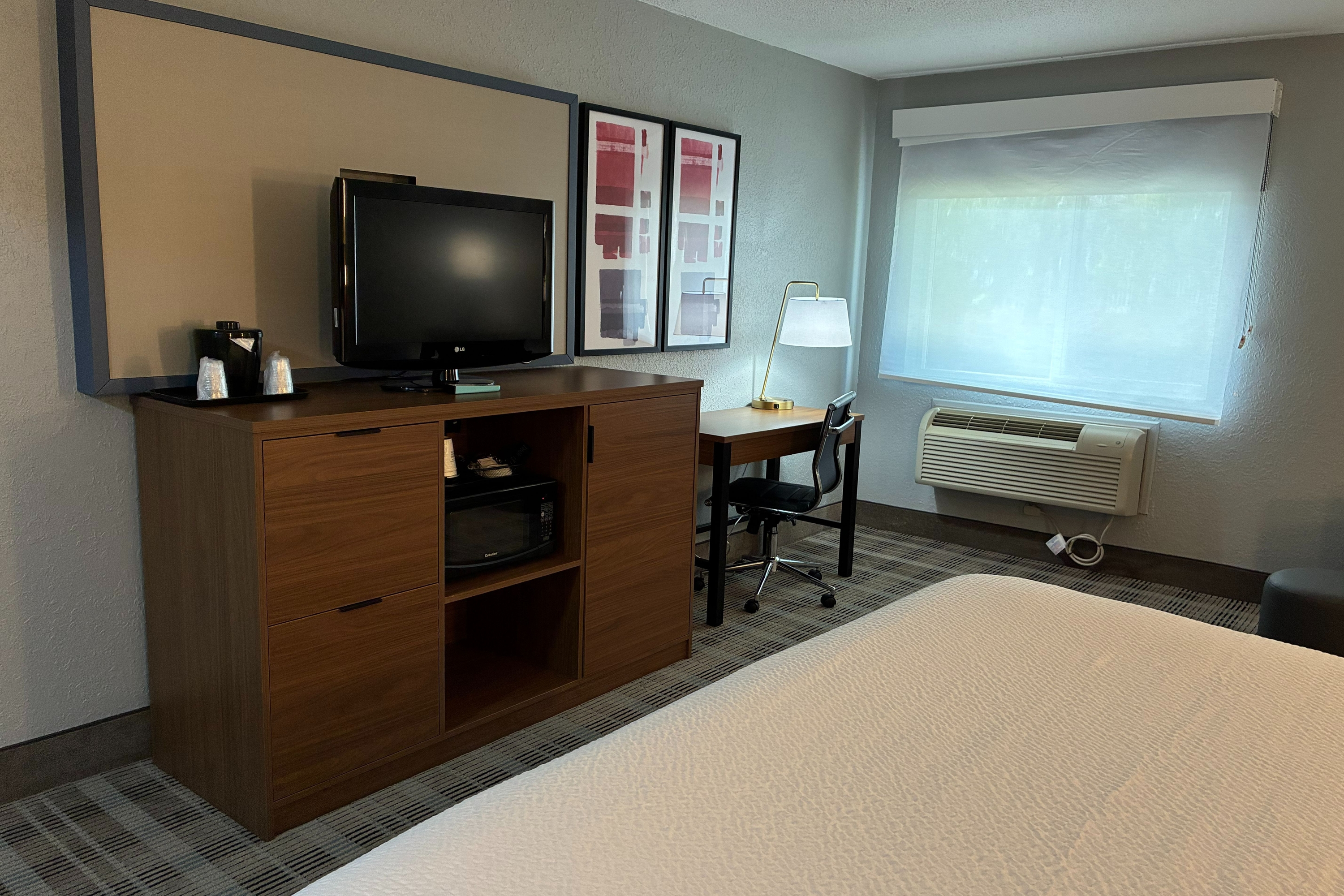 Guest room feature at the AmericInn by Wyndham Holland MI in Holland, Michigan