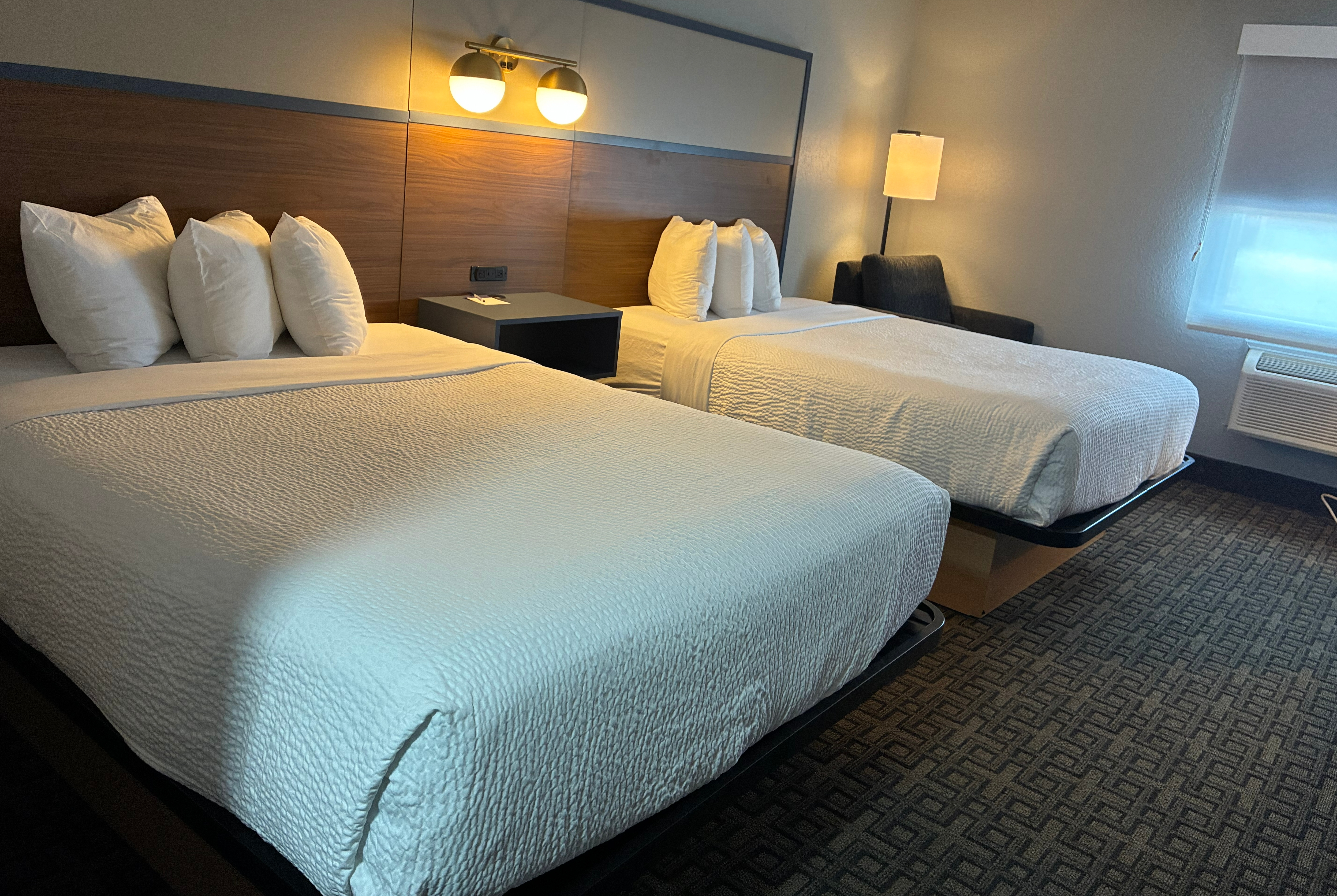 Guest room at the AmericInn by Wyndham Holland MI in Holland, Michigan