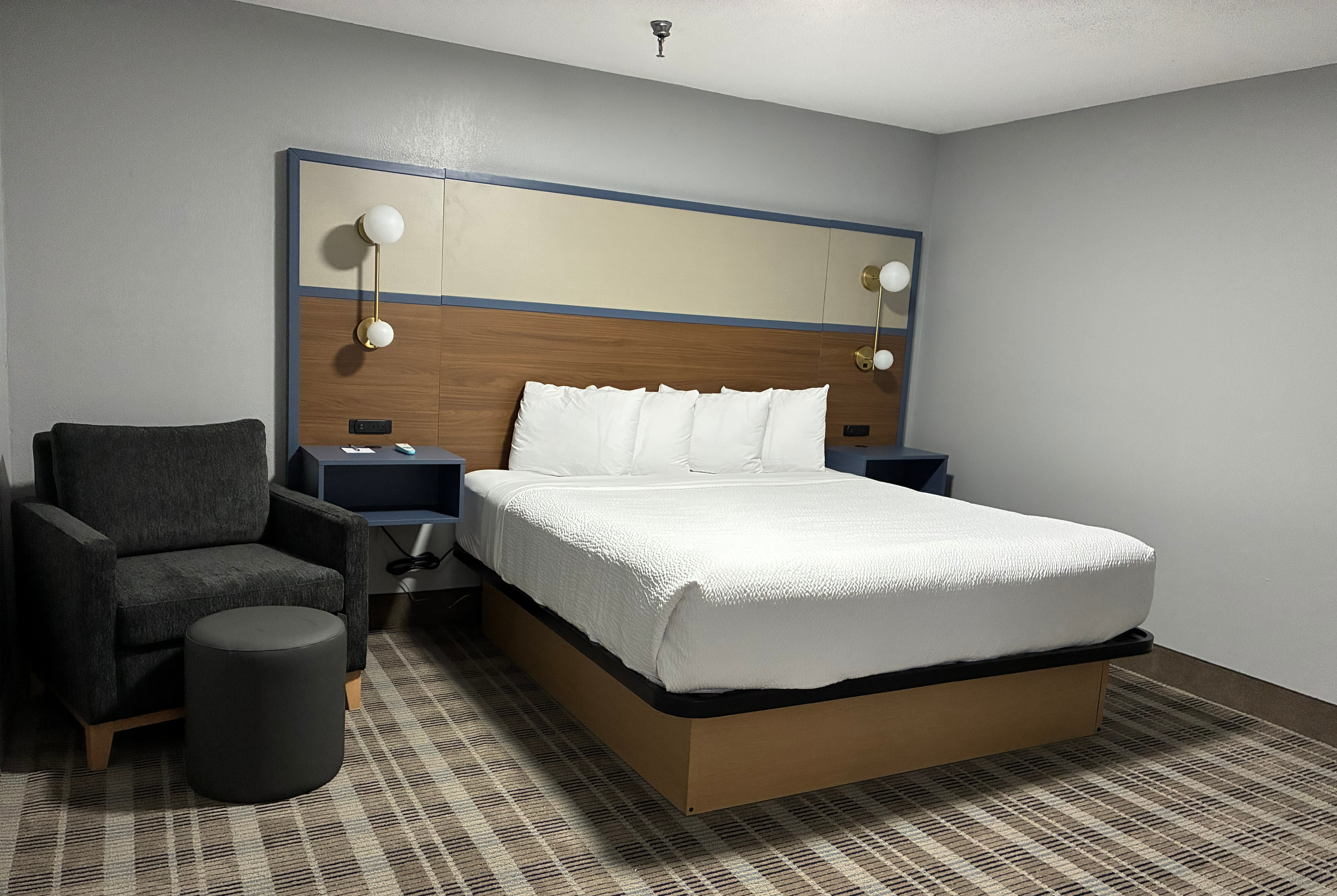 Guest room at the AmericInn by Wyndham Holland MI in Holland, Michigan