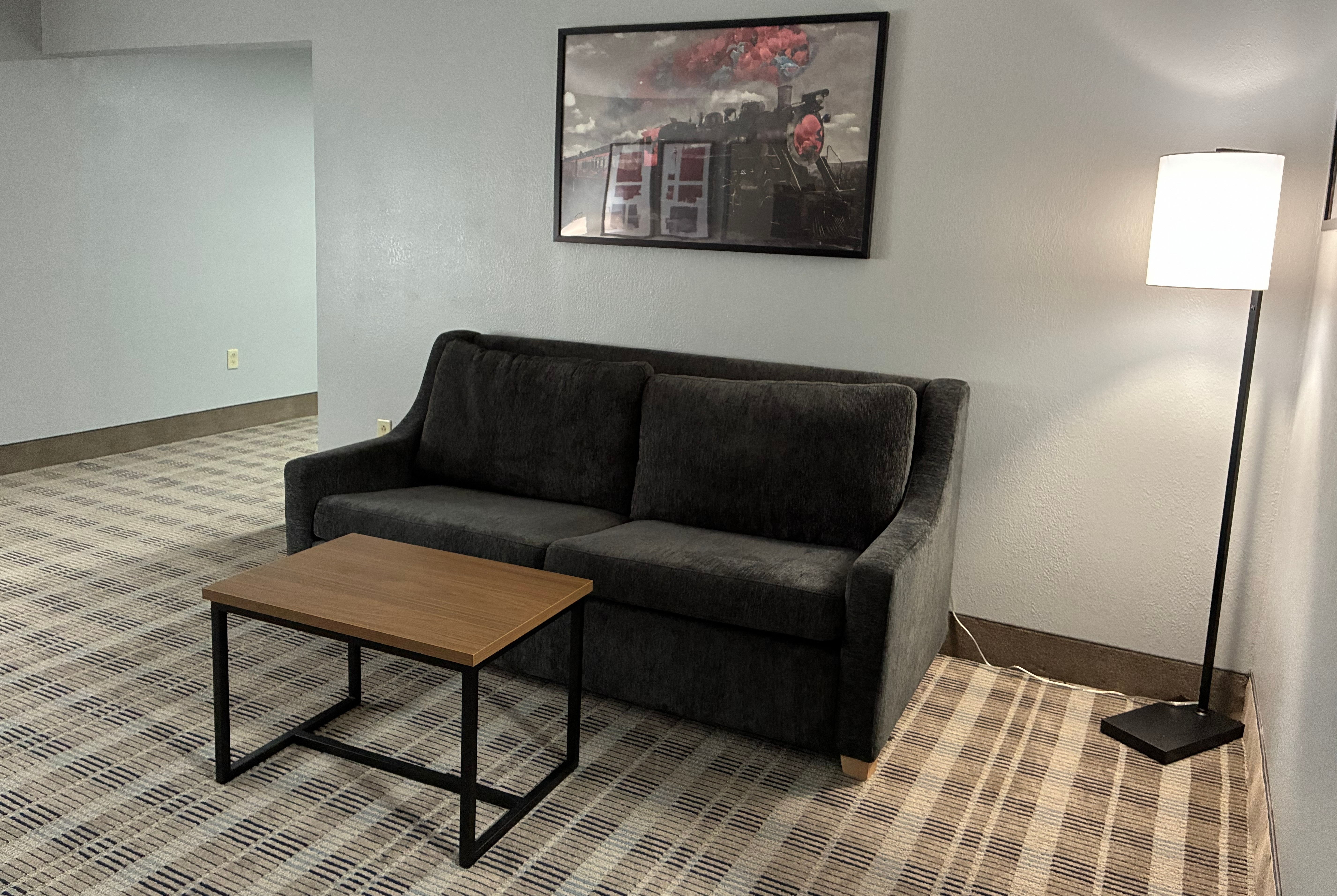 Guest room at the AmericInn by Wyndham Holland MI in Holland, Michigan