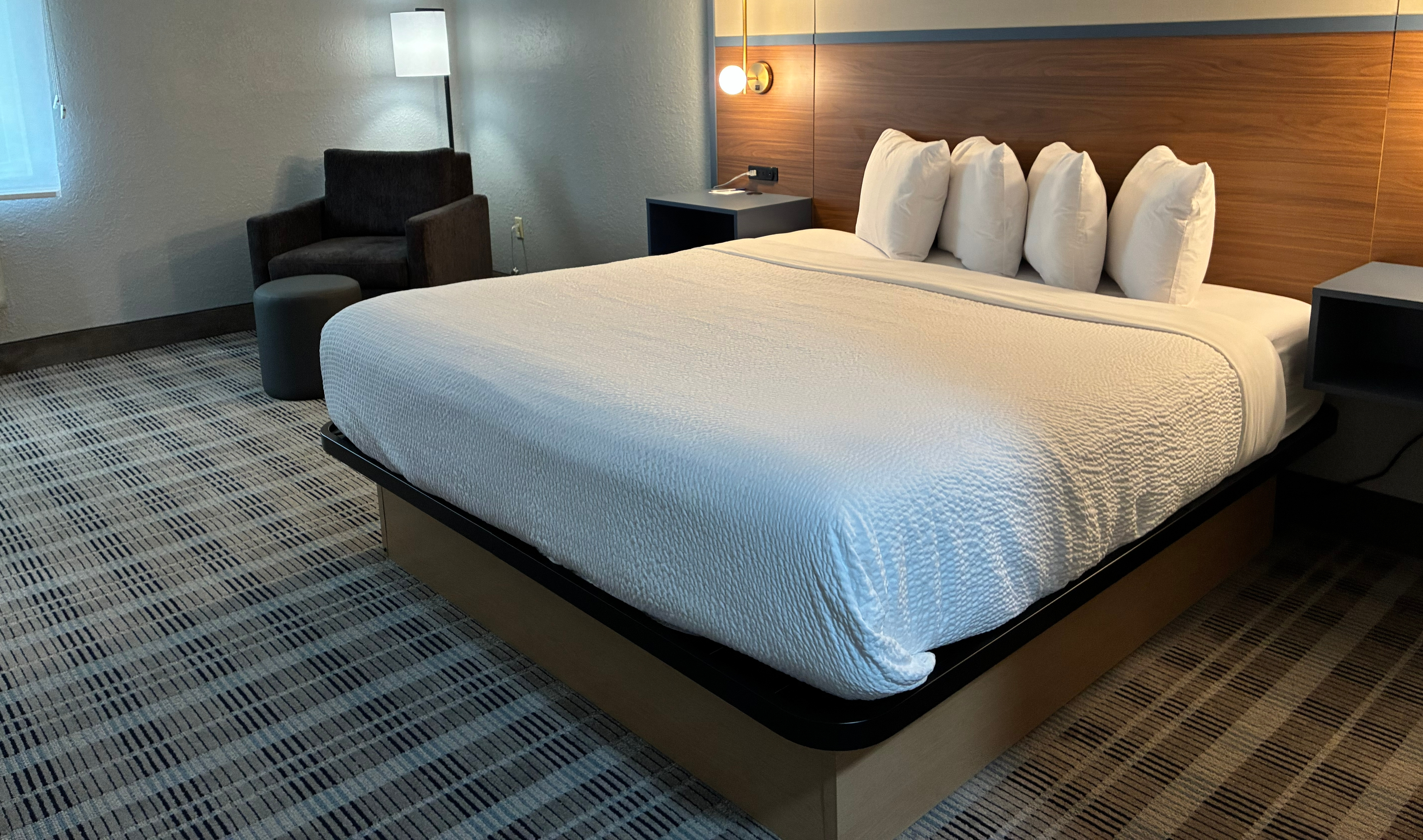 Guest room at the AmericInn by Wyndham Holland MI in Holland, Michigan