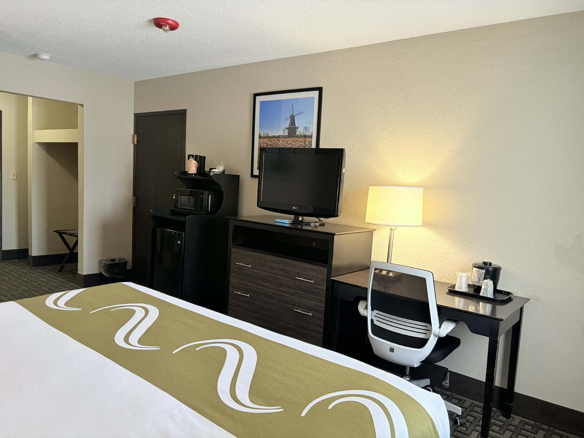 Guest room at the AmericInn by Wyndham Holland MI in Holland, Michigan