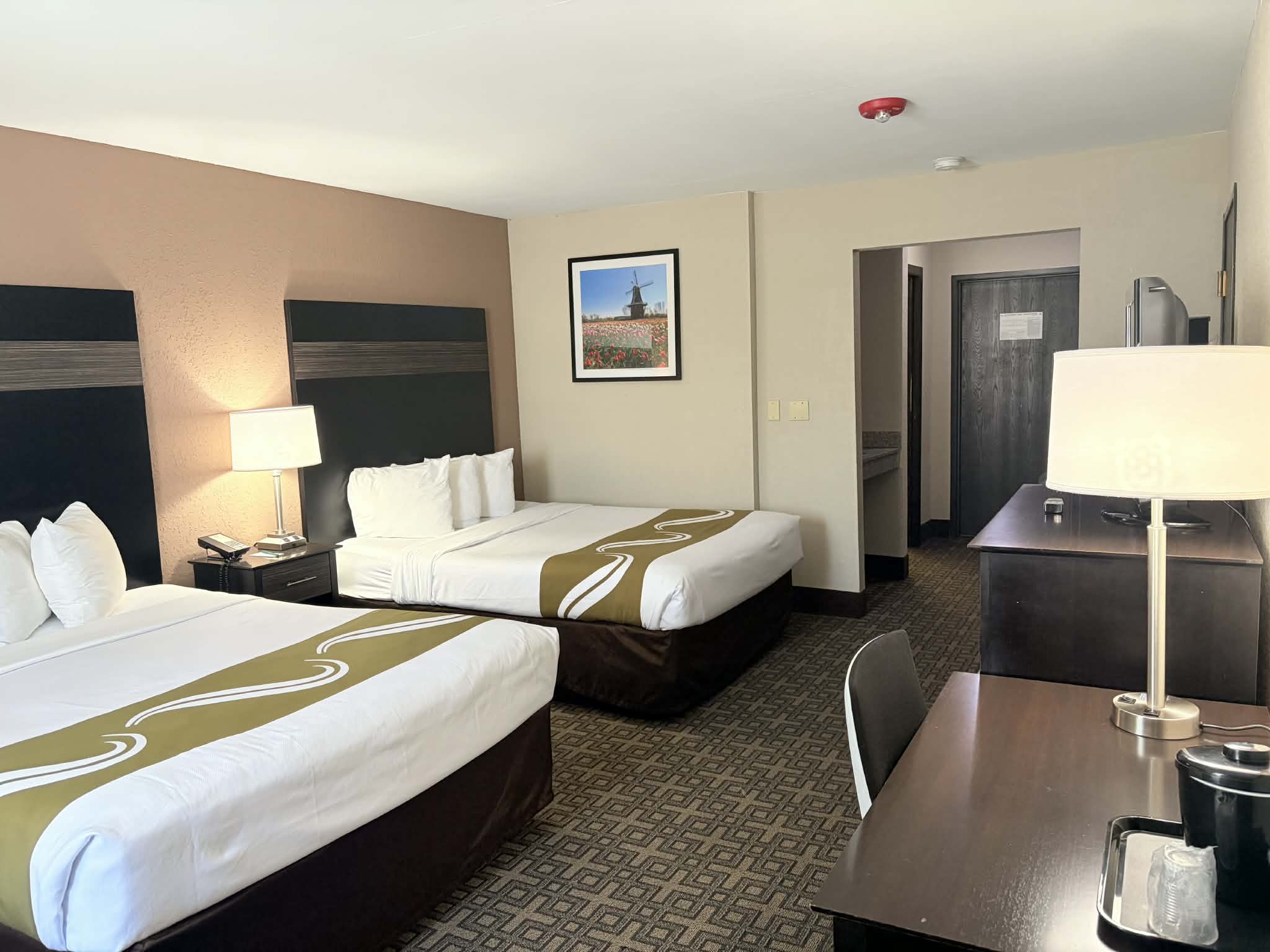 Guest room at the AmericInn by Wyndham Holland MI in Holland, Michigan