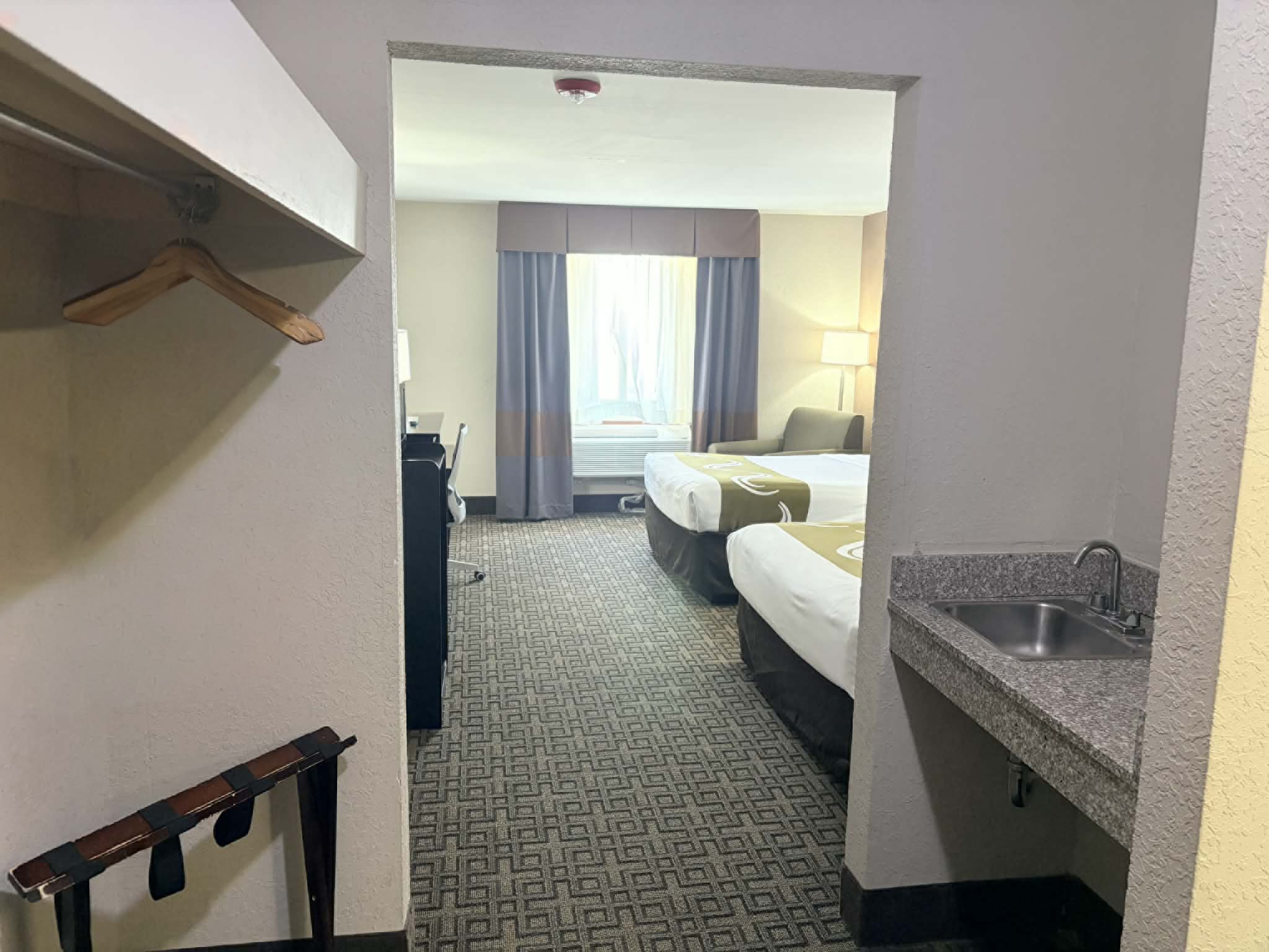 Guest room at the AmericInn by Wyndham Holland MI in Holland, Michigan