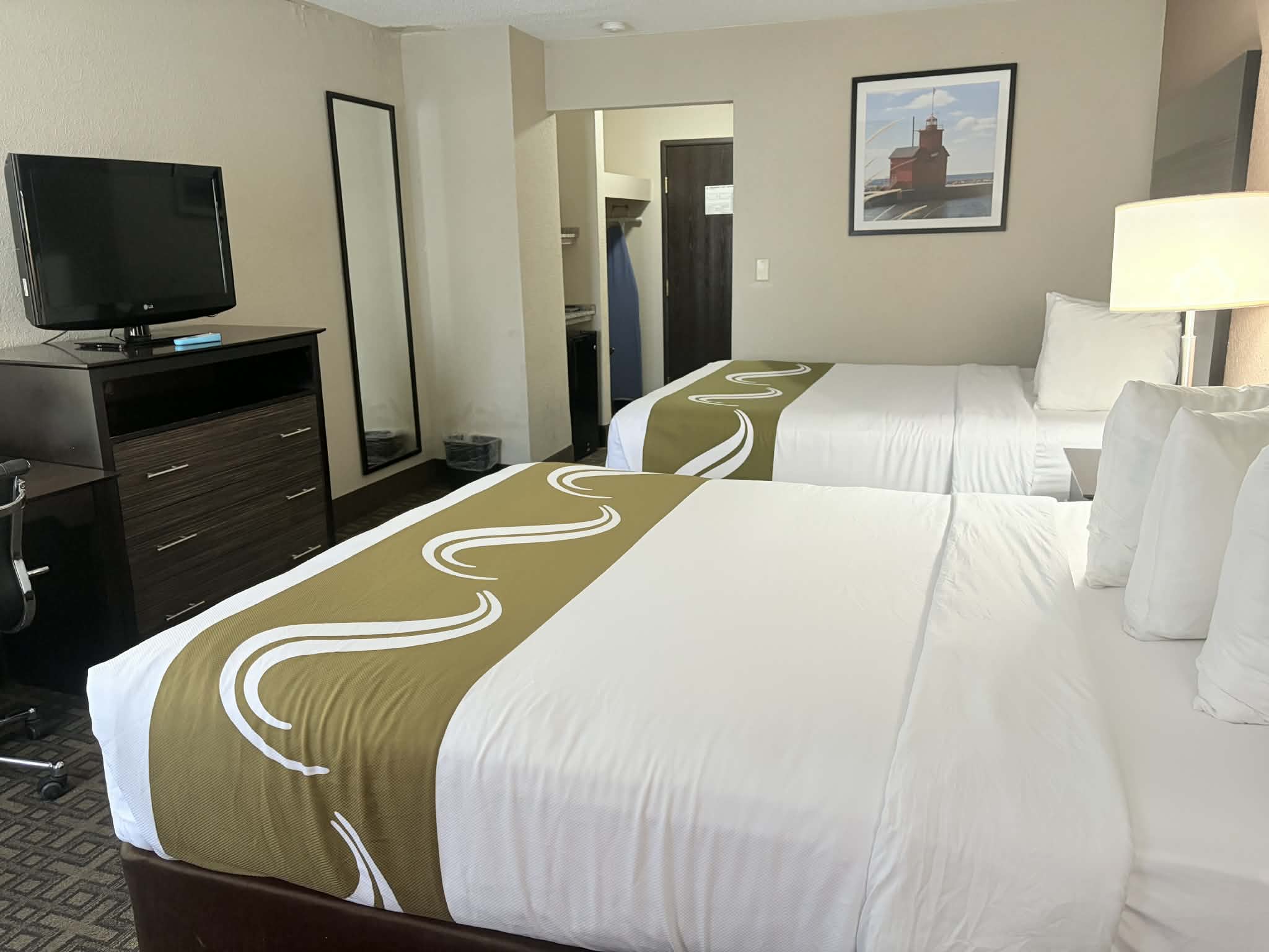 Guest room at the AmericInn by Wyndham Holland MI in Holland, Michigan