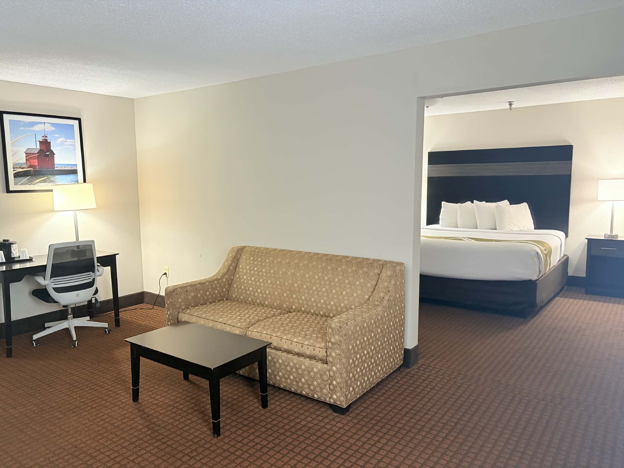 Guest room at the AmericInn by Wyndham Holland MI in Holland, Michigan