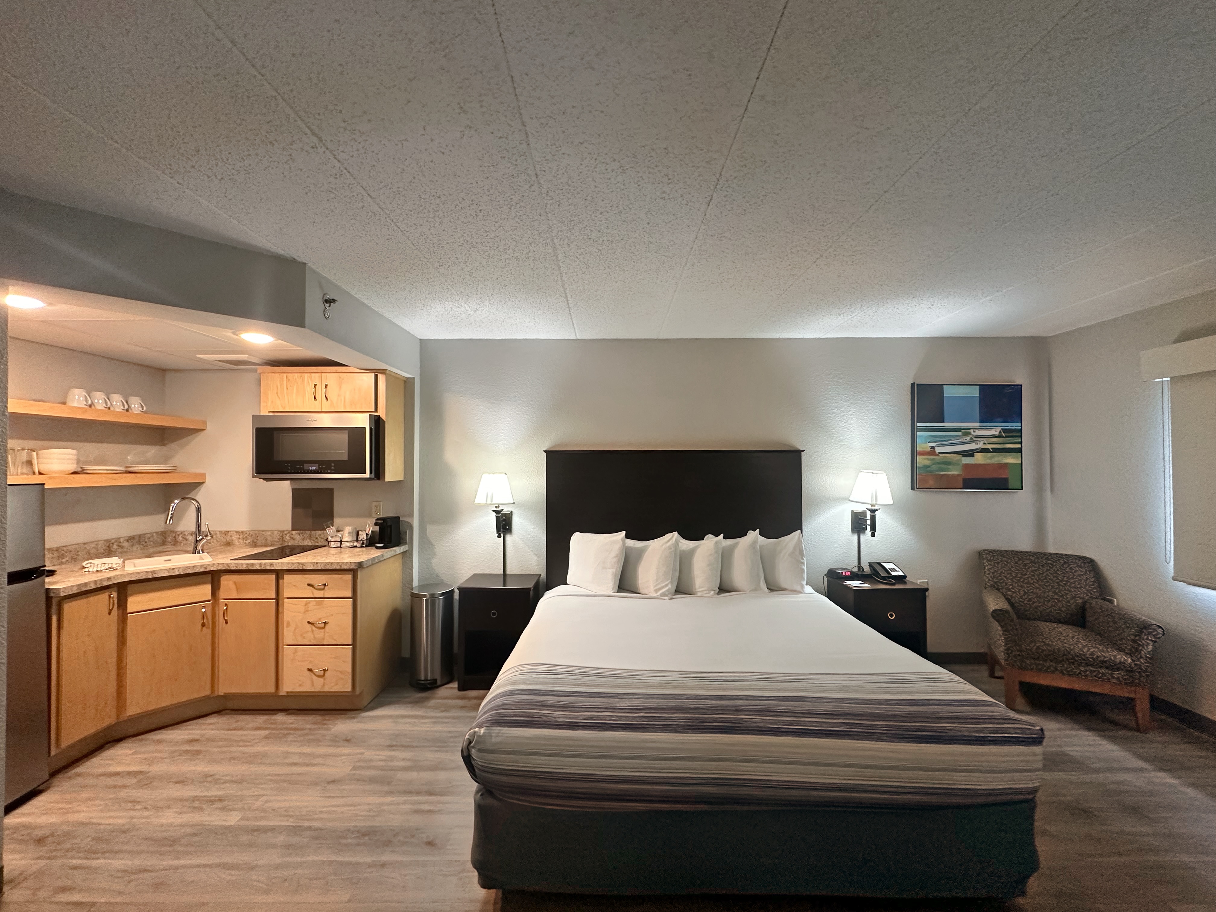 Guest room at the AmericInn by Wyndham Menominee in Menominee, Michigan