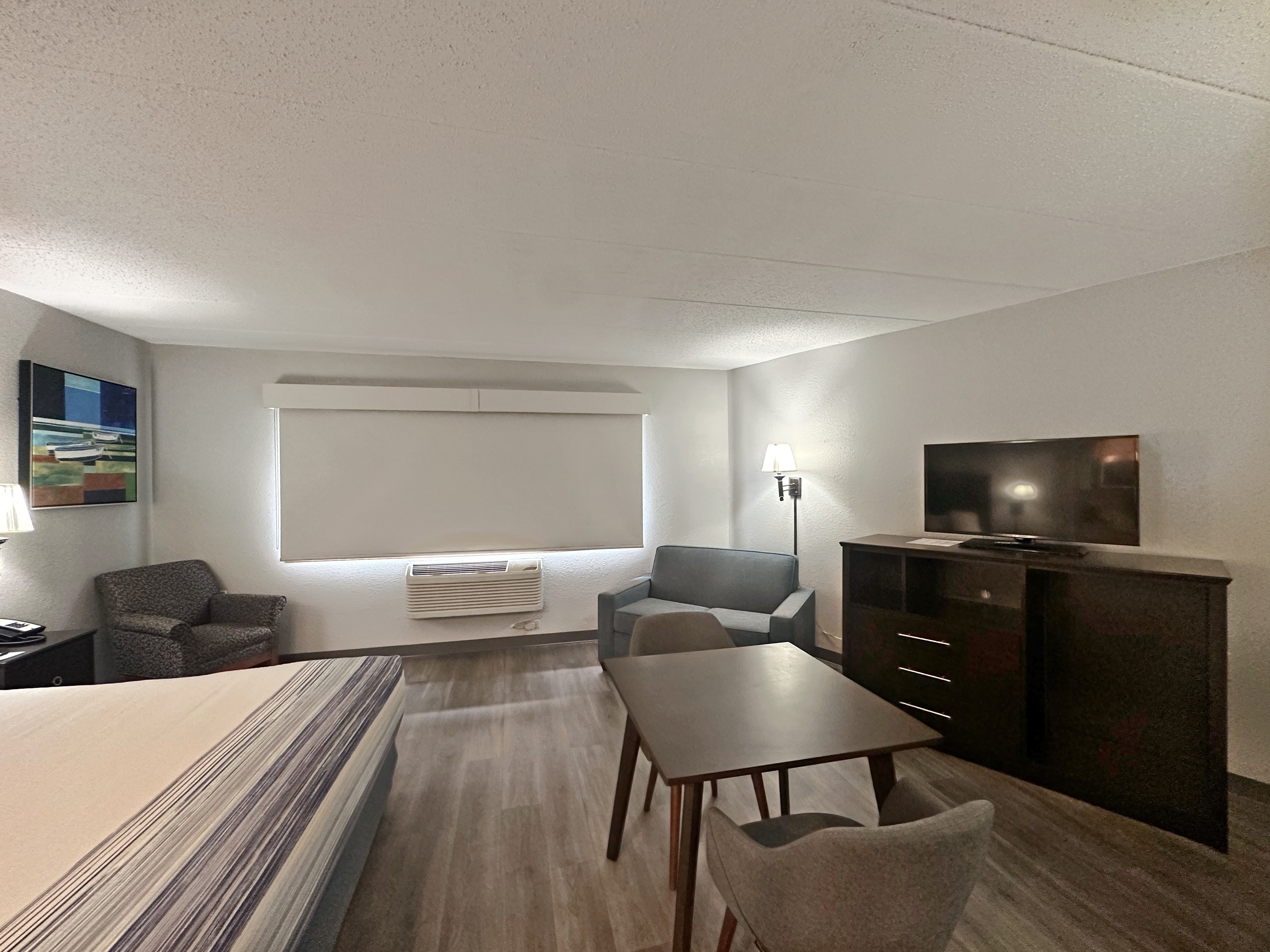 Guest room at the AmericInn by Wyndham Menominee in Menominee, Michigan