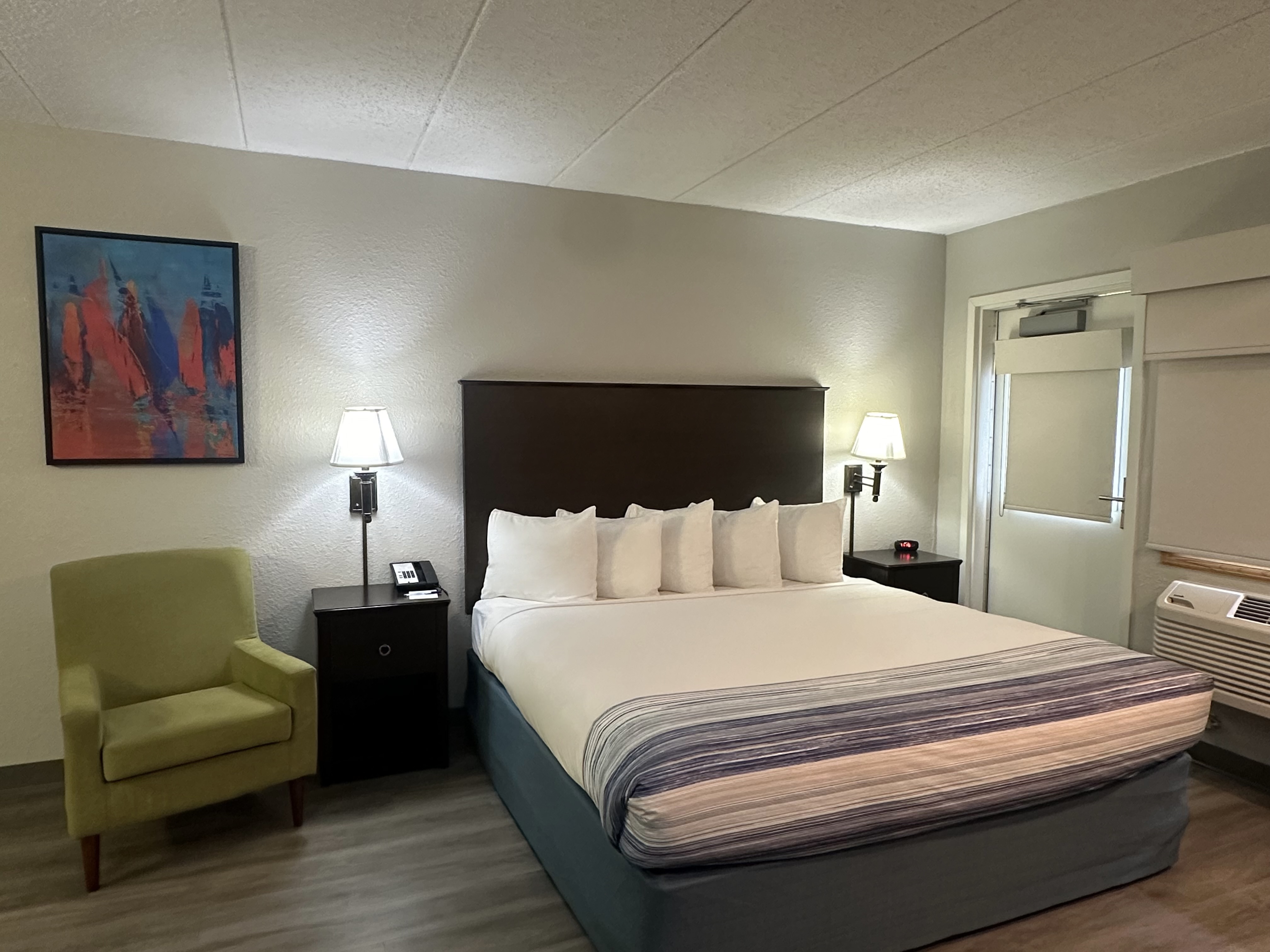 Guest room at the AmericInn by Wyndham Menominee in Menominee, Michigan