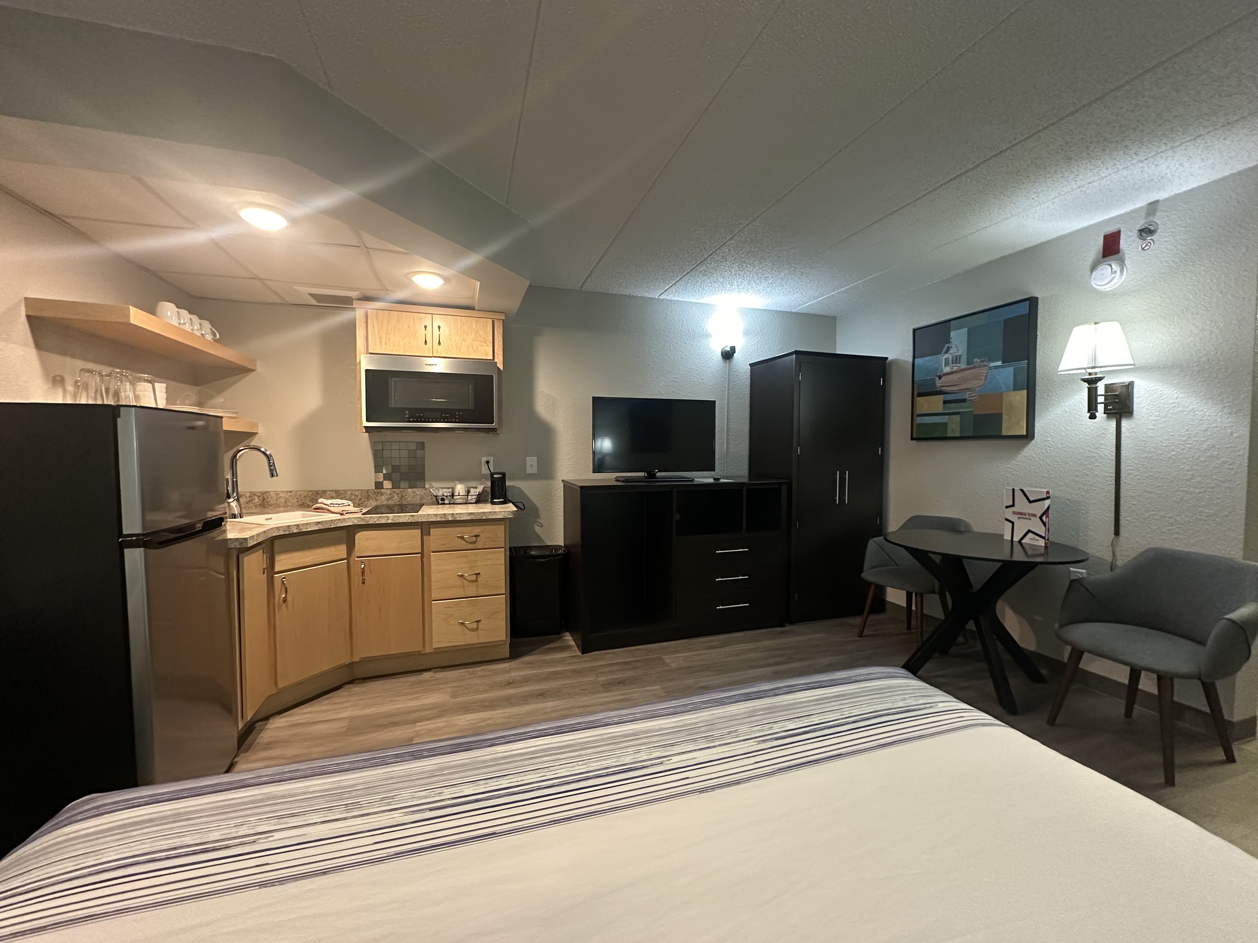 Guest room at the AmericInn by Wyndham Menominee in Menominee, Michigan