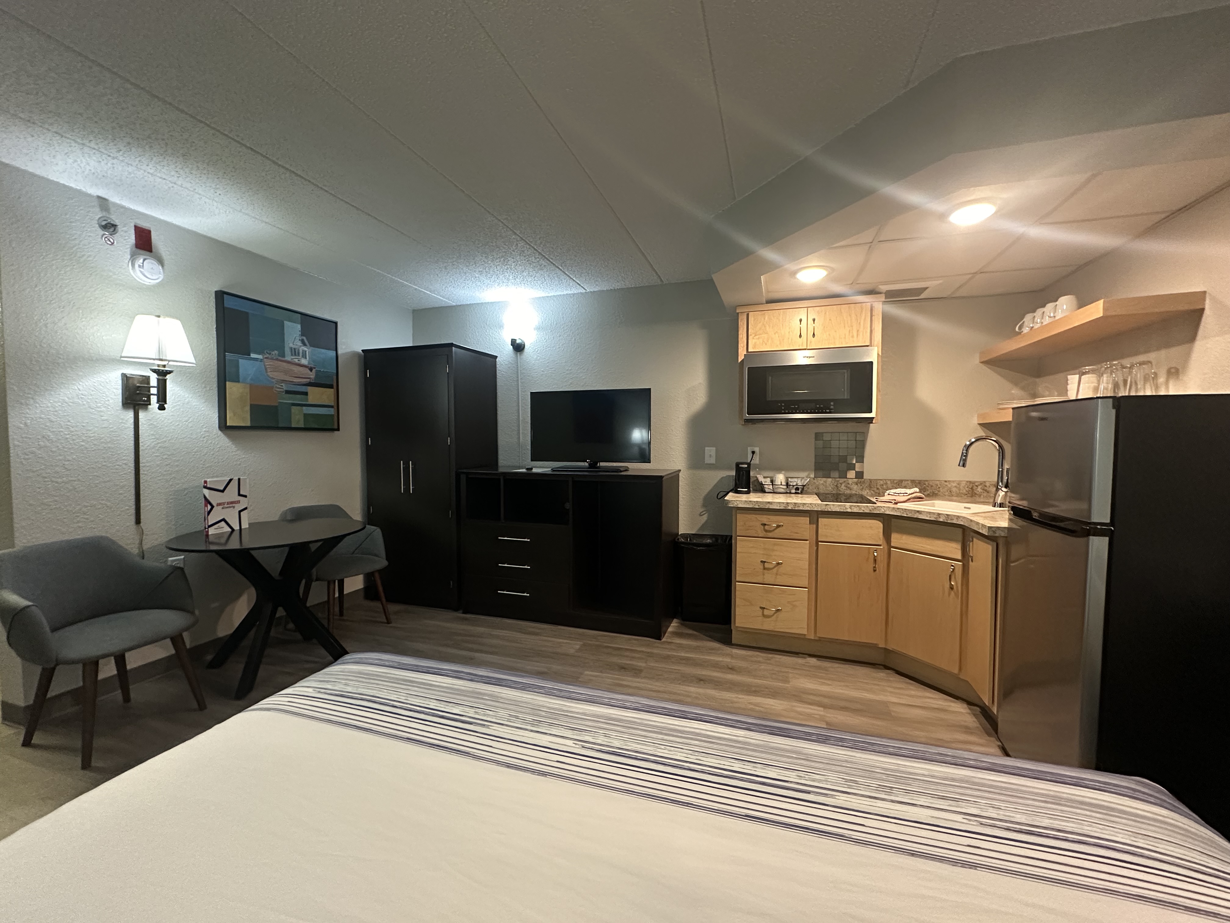 Guest room at the AmericInn by Wyndham Menominee in Menominee, Michigan