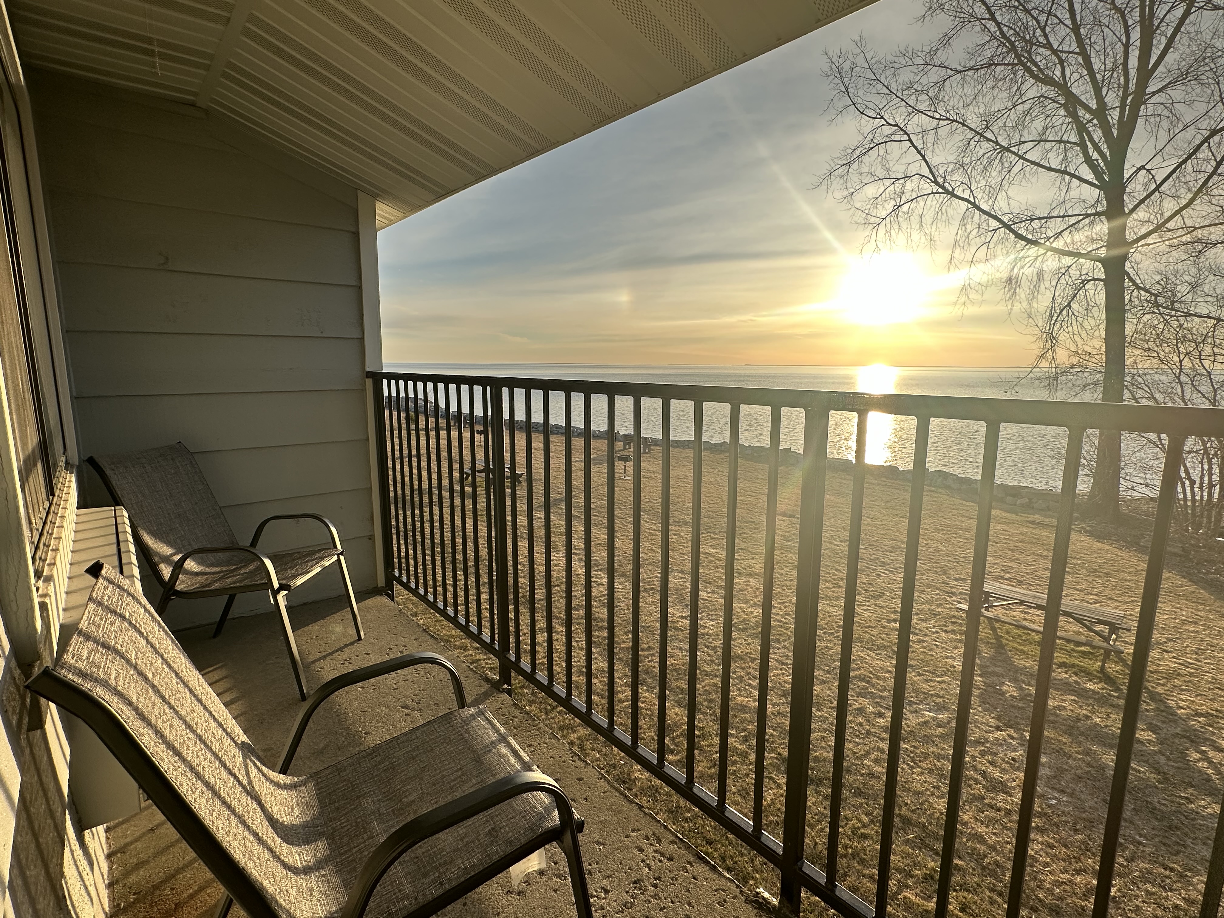 Guest room at the AmericInn by Wyndham Menominee in Menominee, Michigan