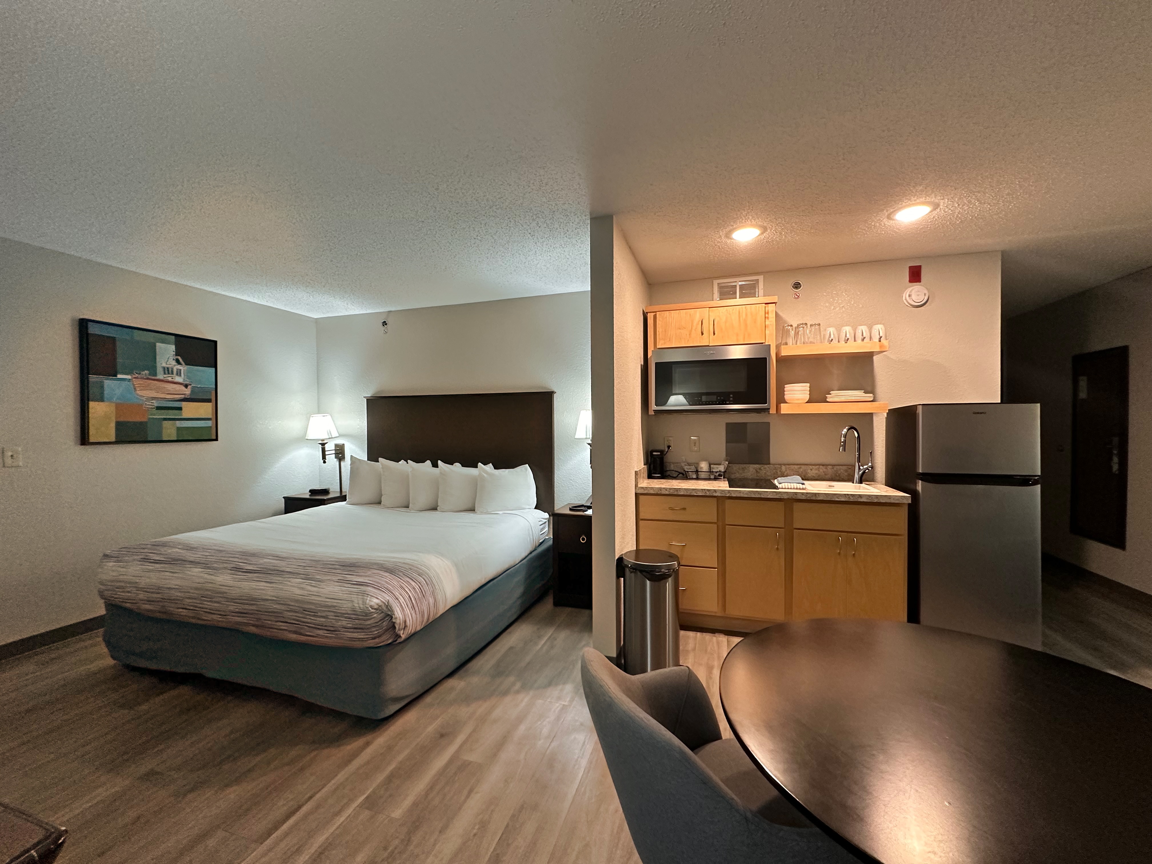 Guest room at the AmericInn by Wyndham Menominee in Menominee, Michigan