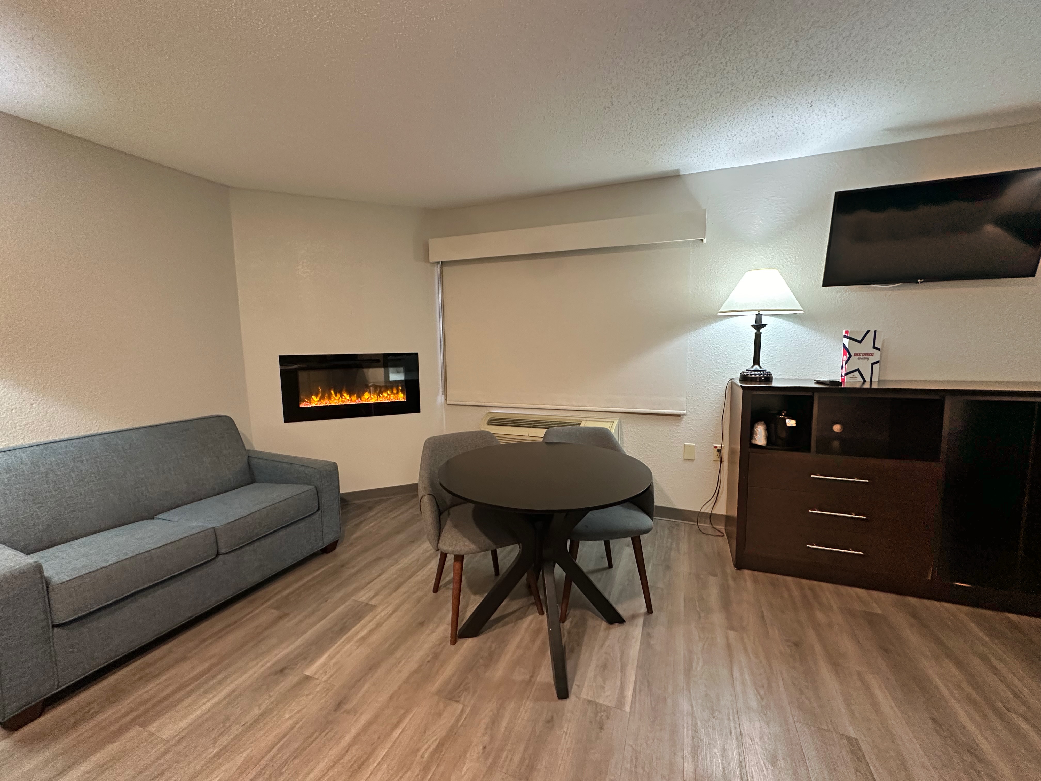 Guest room at the AmericInn by Wyndham Menominee in Menominee, Michigan