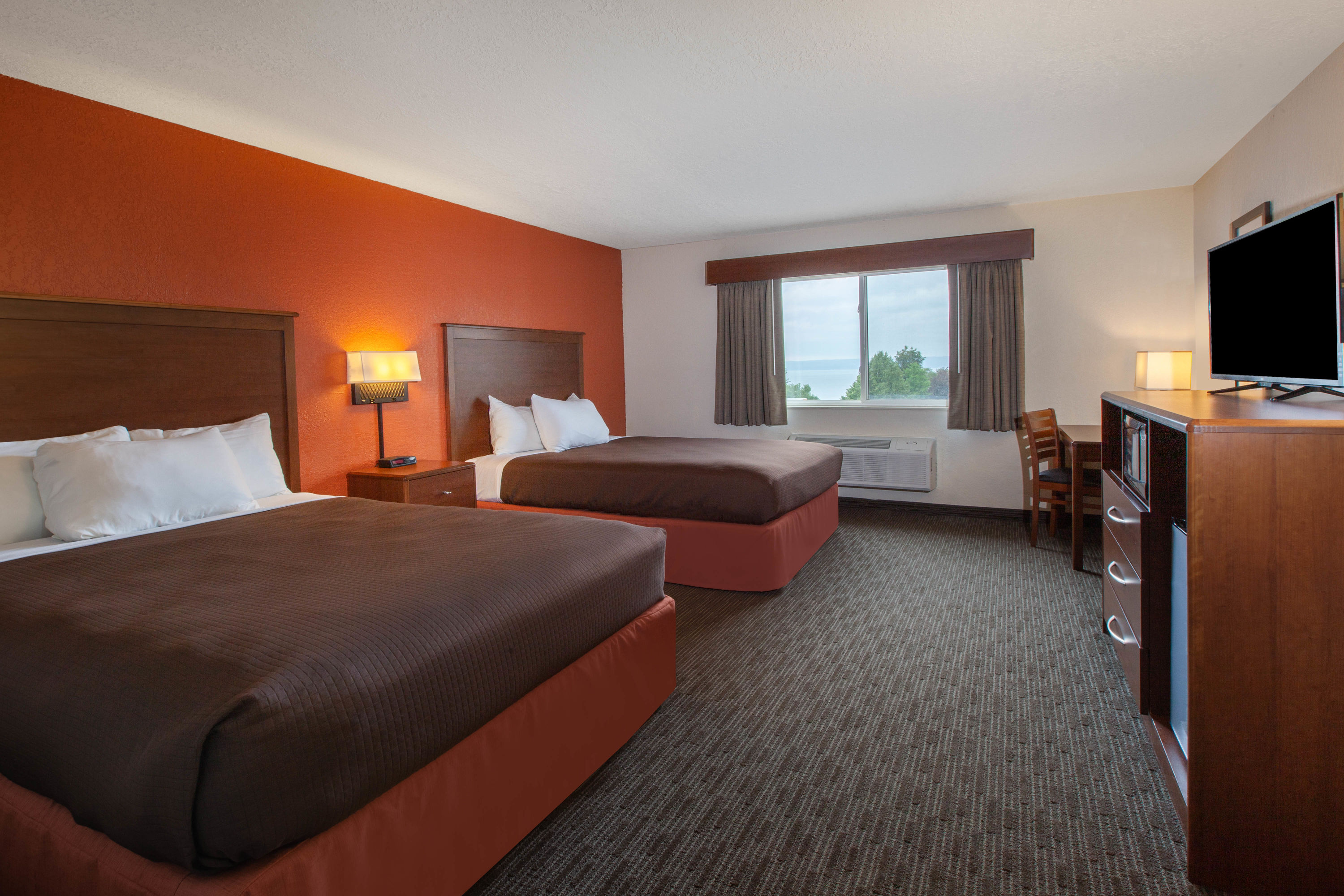 Guest room at the AmericInn by Wyndham Petoskey in Petoskey, Michigan