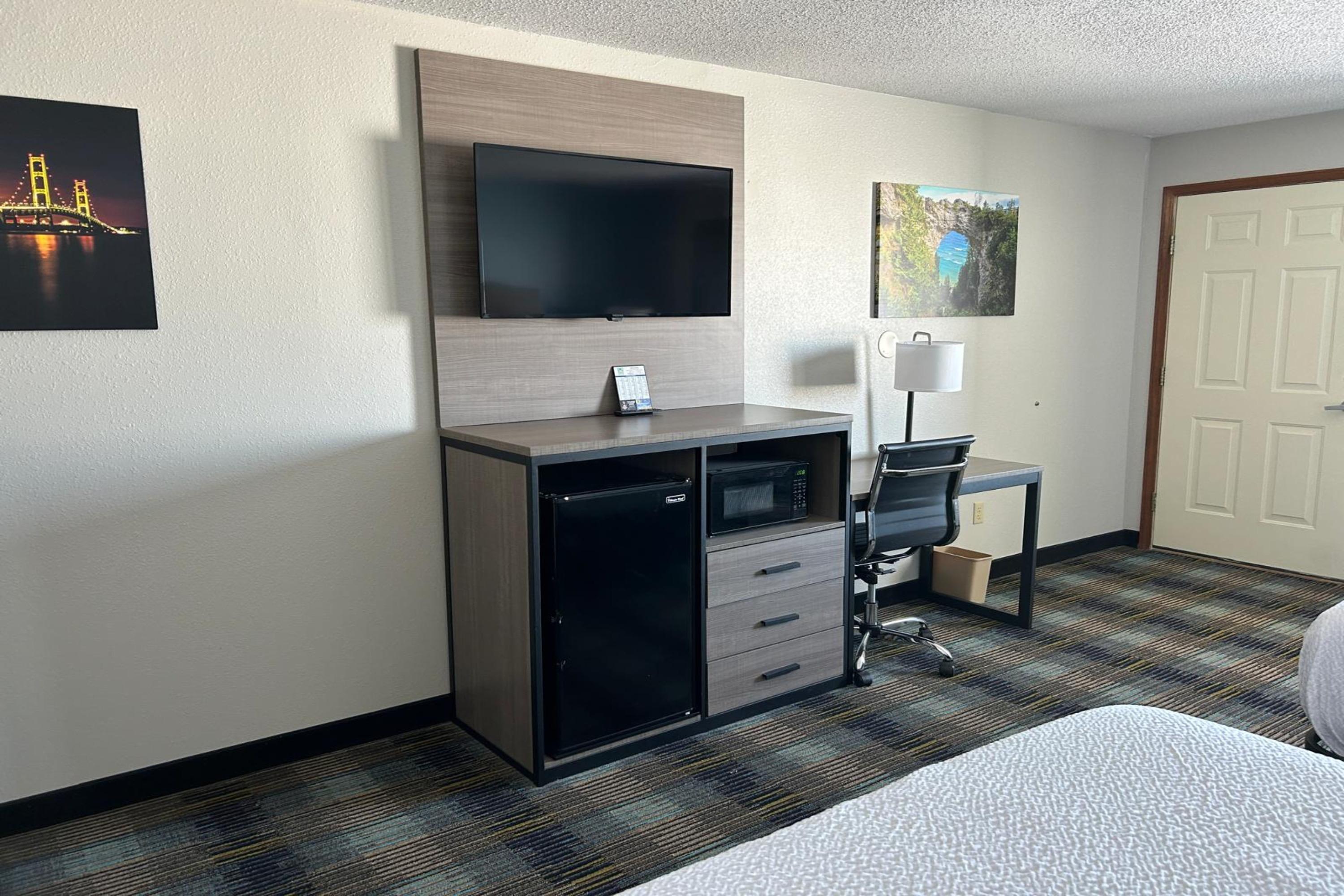 Guest room at the AmericInn by Wyndham Saint Ignace in Saint Ignace, Michigan