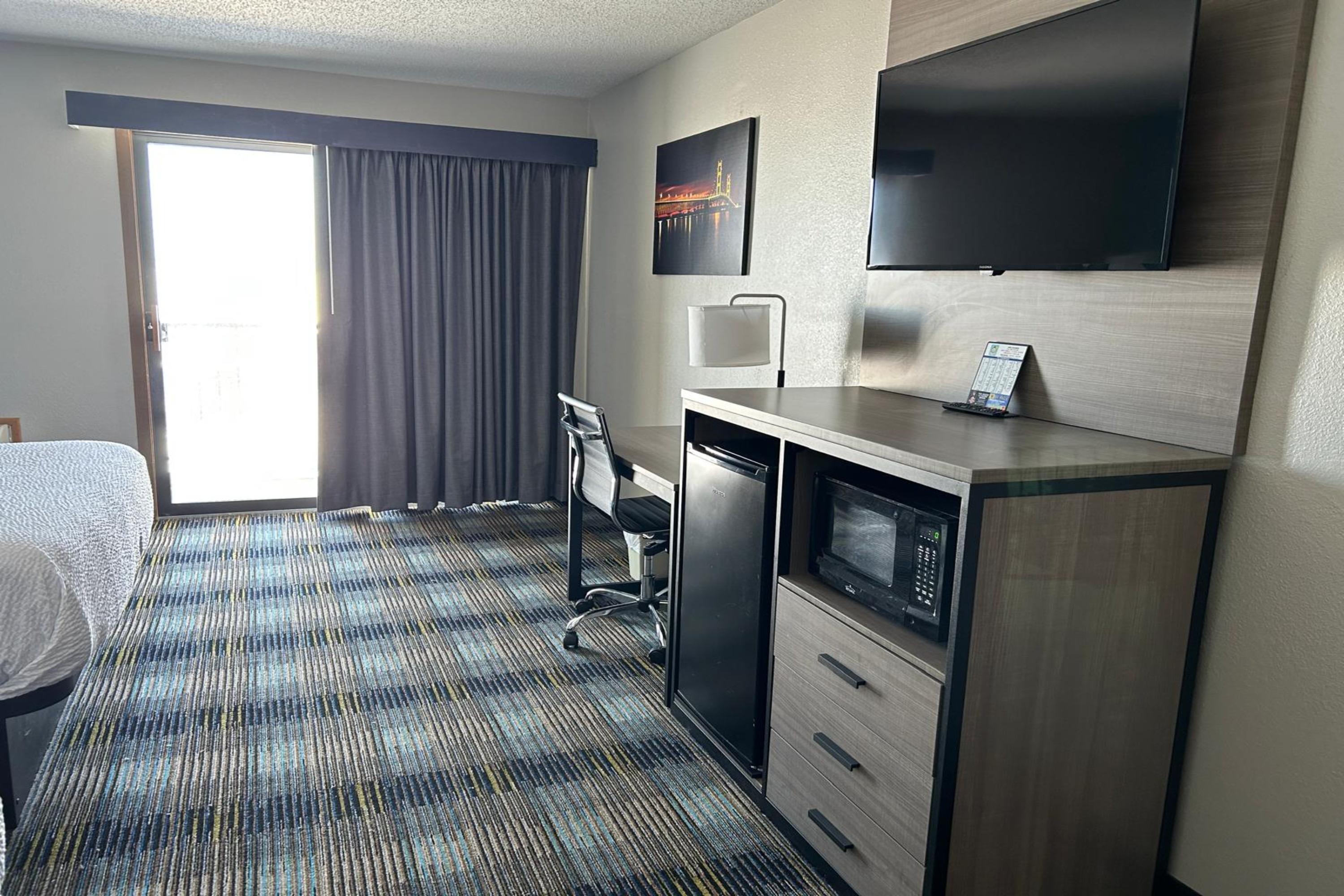 Guest room at the AmericInn by Wyndham Saint Ignace in Saint Ignace, Michigan