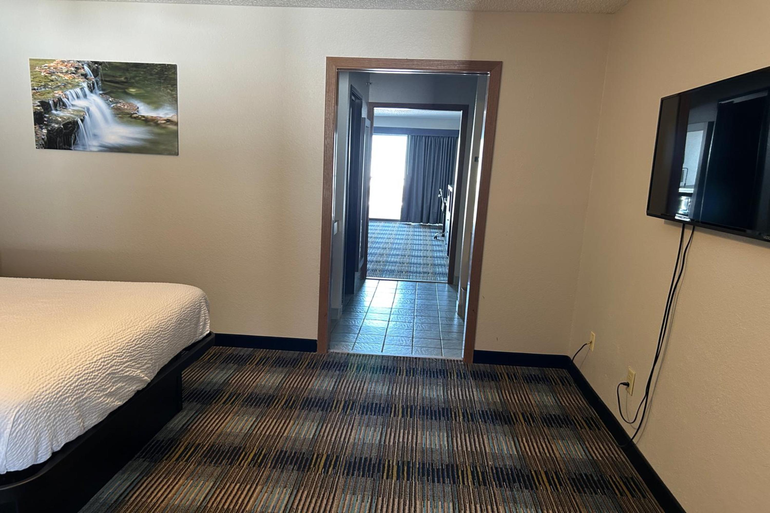 Guest room at the AmericInn by Wyndham Saint Ignace in Saint Ignace, Michigan