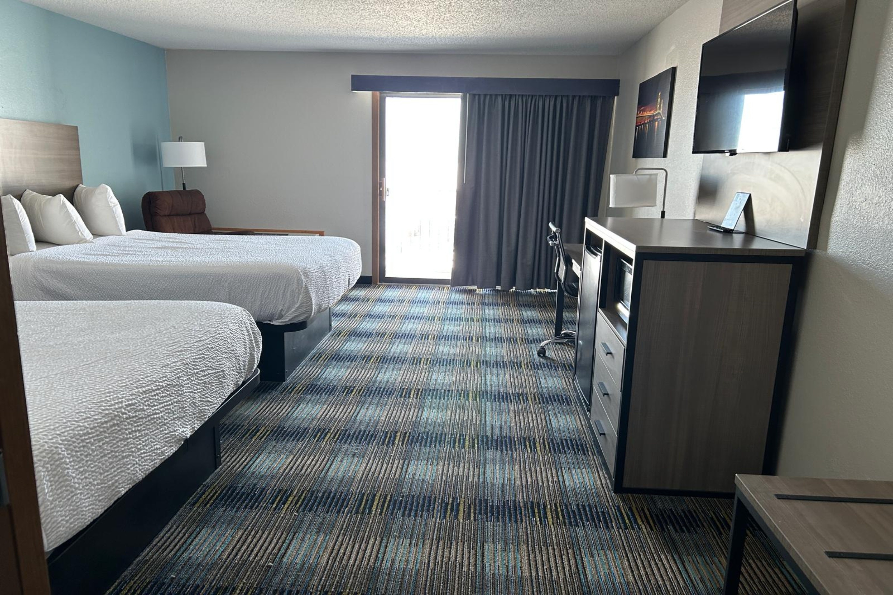 Guest room at the AmericInn by Wyndham Saint Ignace in Saint Ignace, Michigan