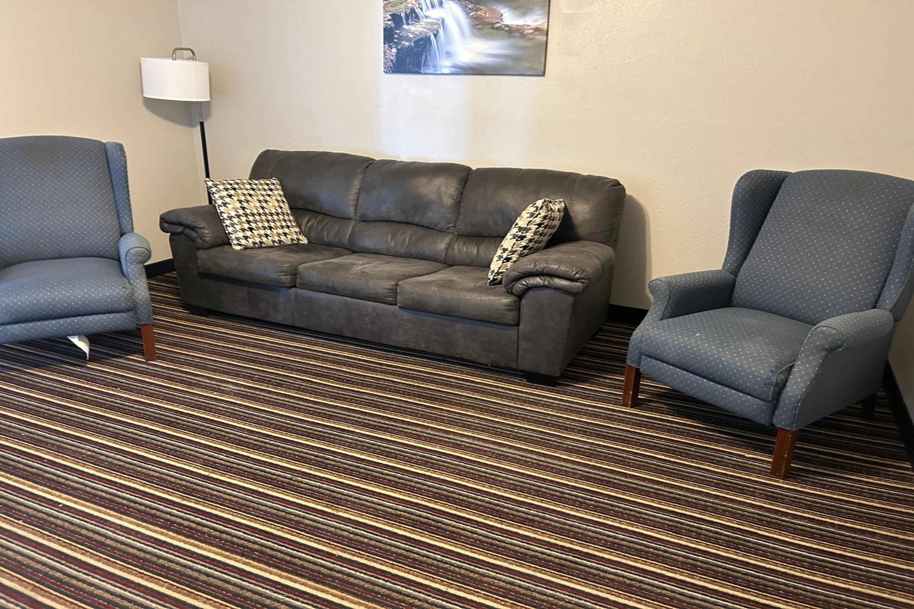 Guest room at the AmericInn by Wyndham Saint Ignace in Saint Ignace, Michigan