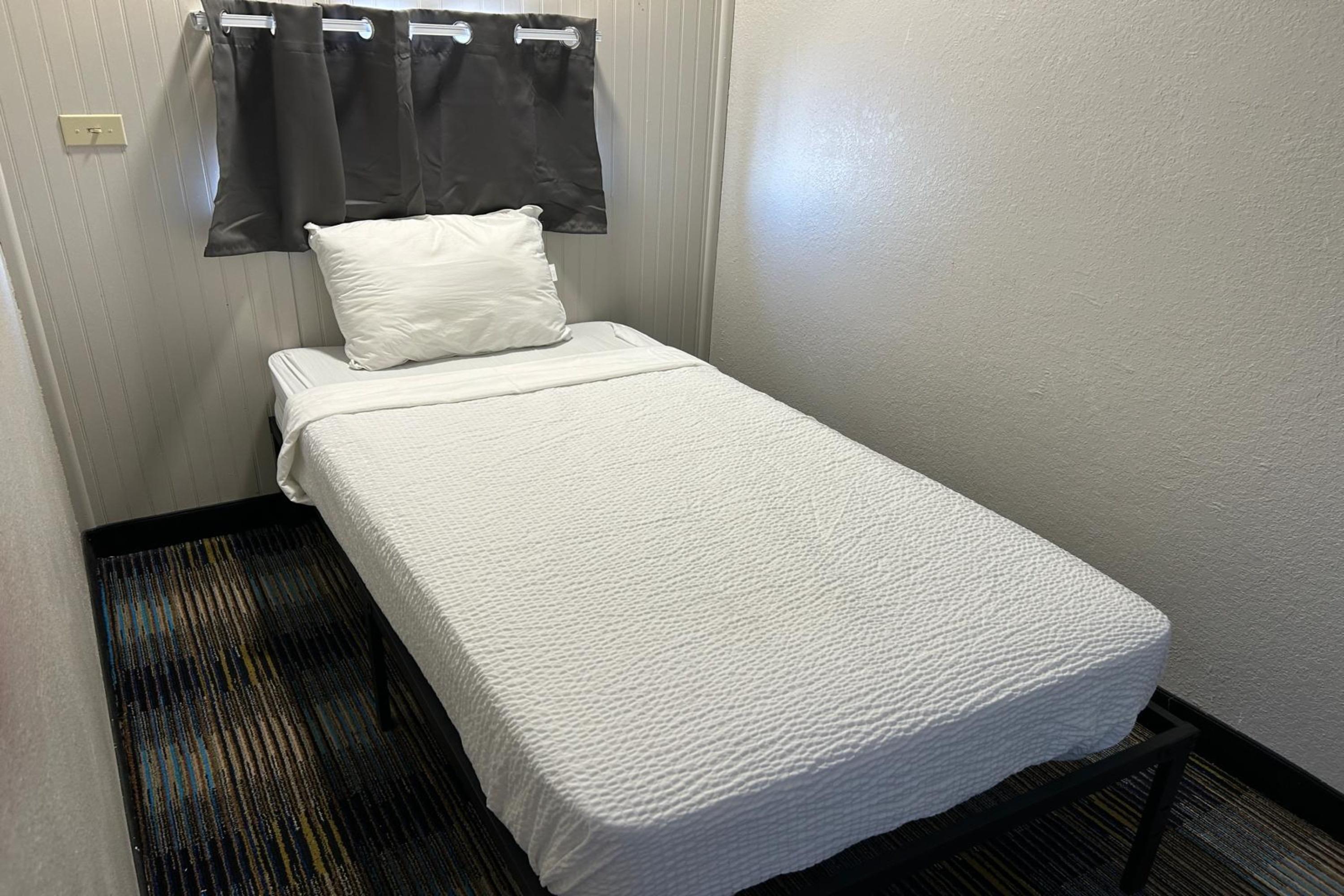 Guest room at the AmericInn by Wyndham Saint Ignace in Saint Ignace, Michigan