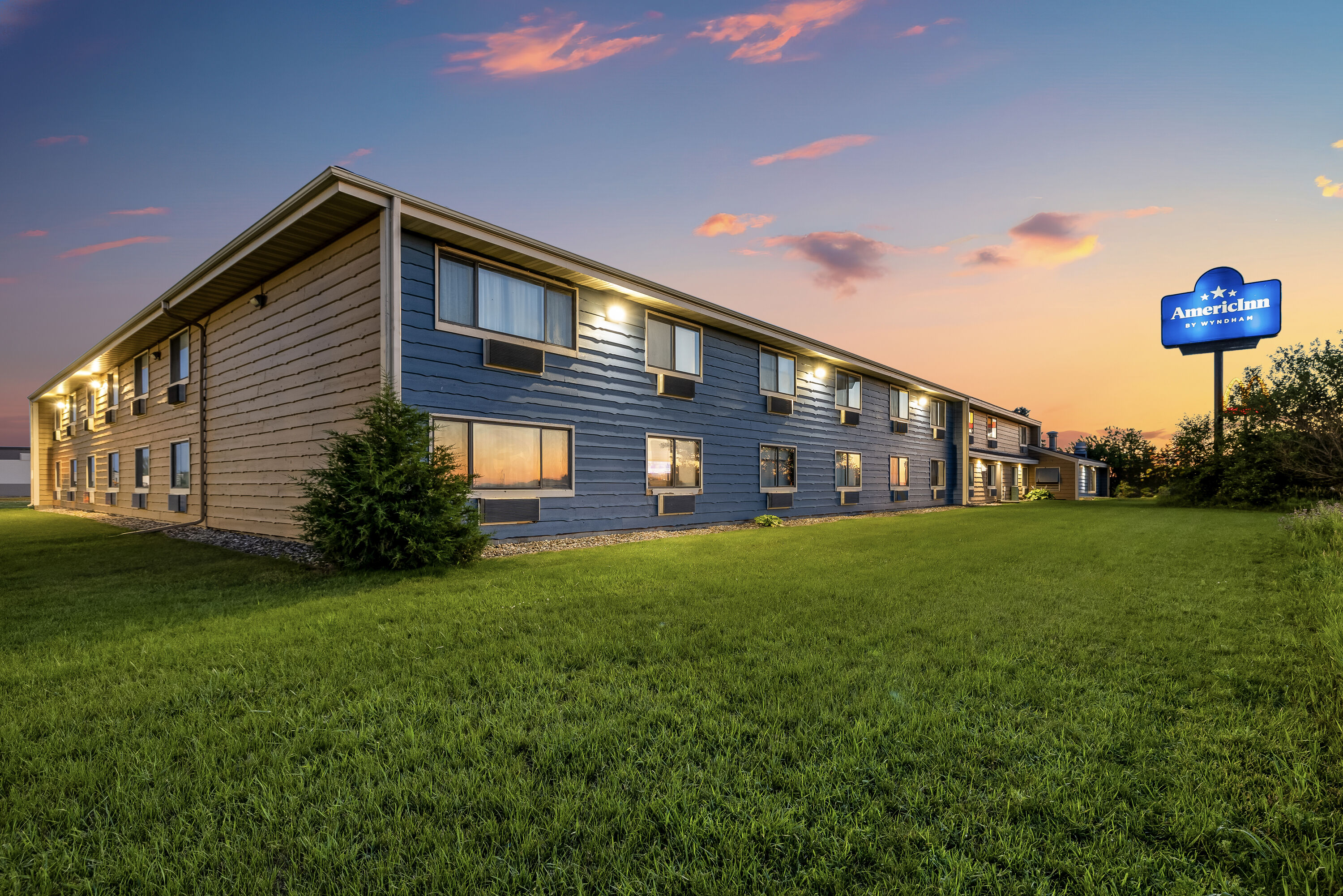 Exterior Dusk Image of AmericInn by Wyndham Albert Lea hotel in Albert Lea, Minnesota