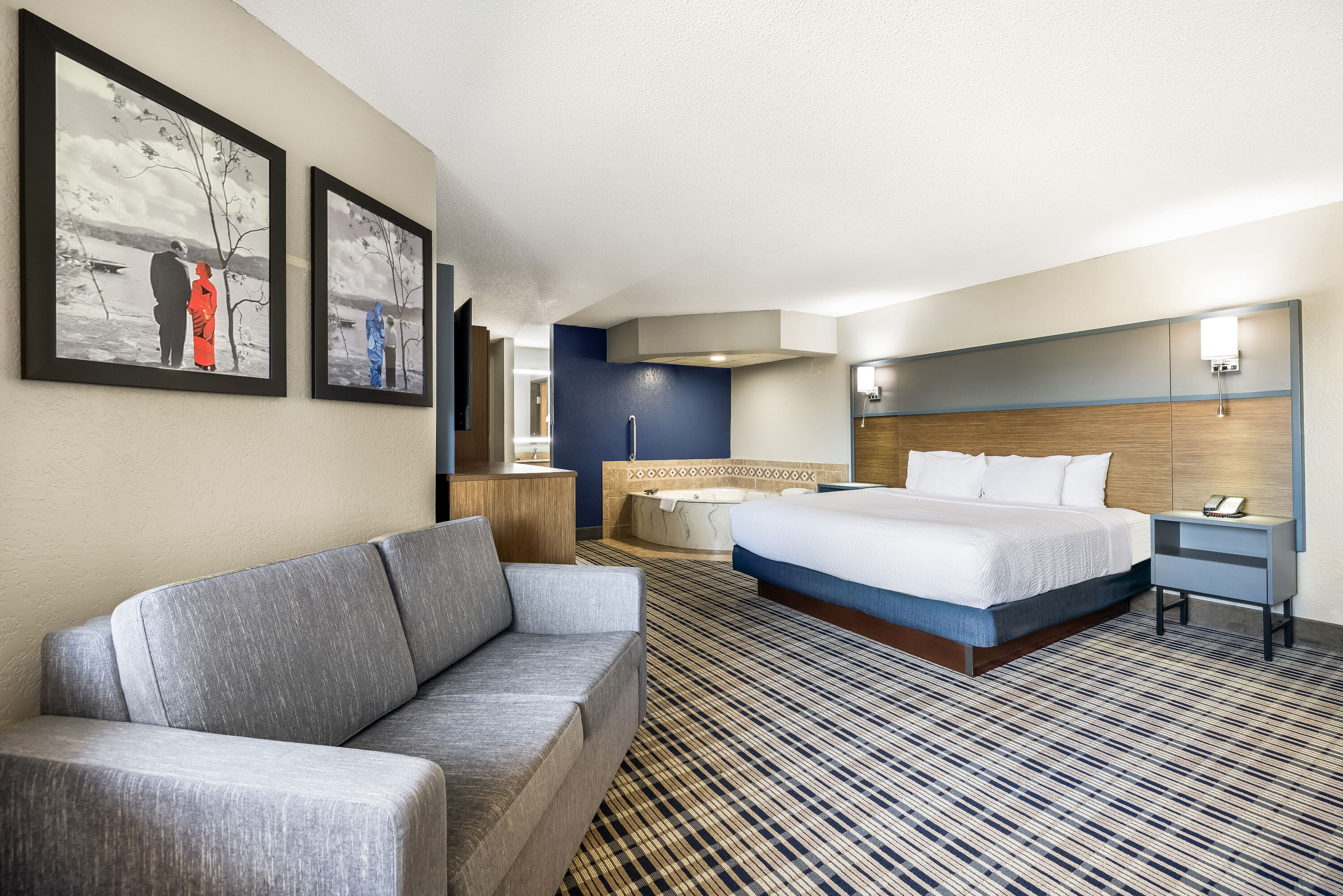 King bed guest room at the AmericInn by Wyndham Albert Lea in Albert Lea, Minnesota
