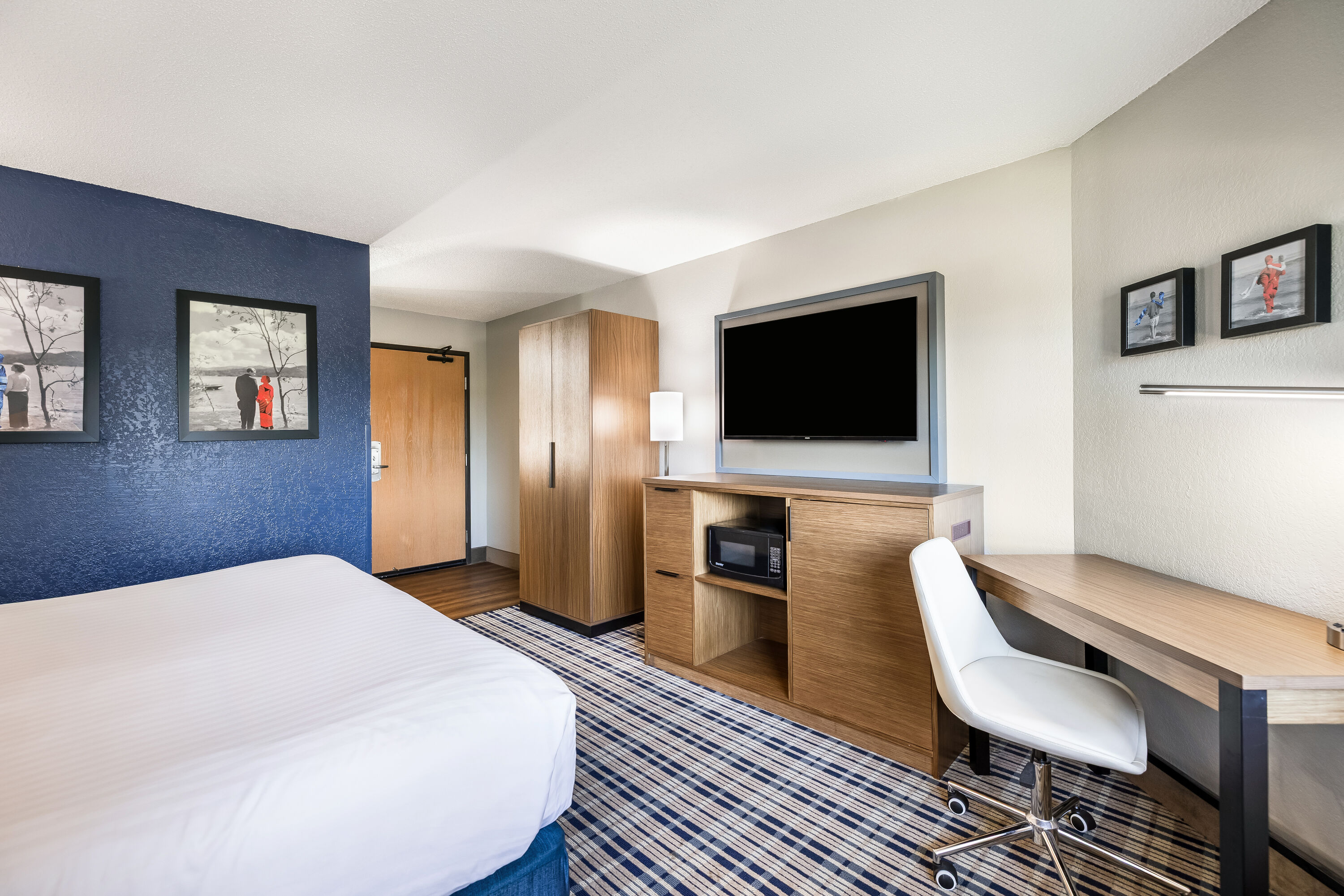 King bed guest room at the AmericInn by Wyndham Albert Lea in Albert Lea, Minnesota