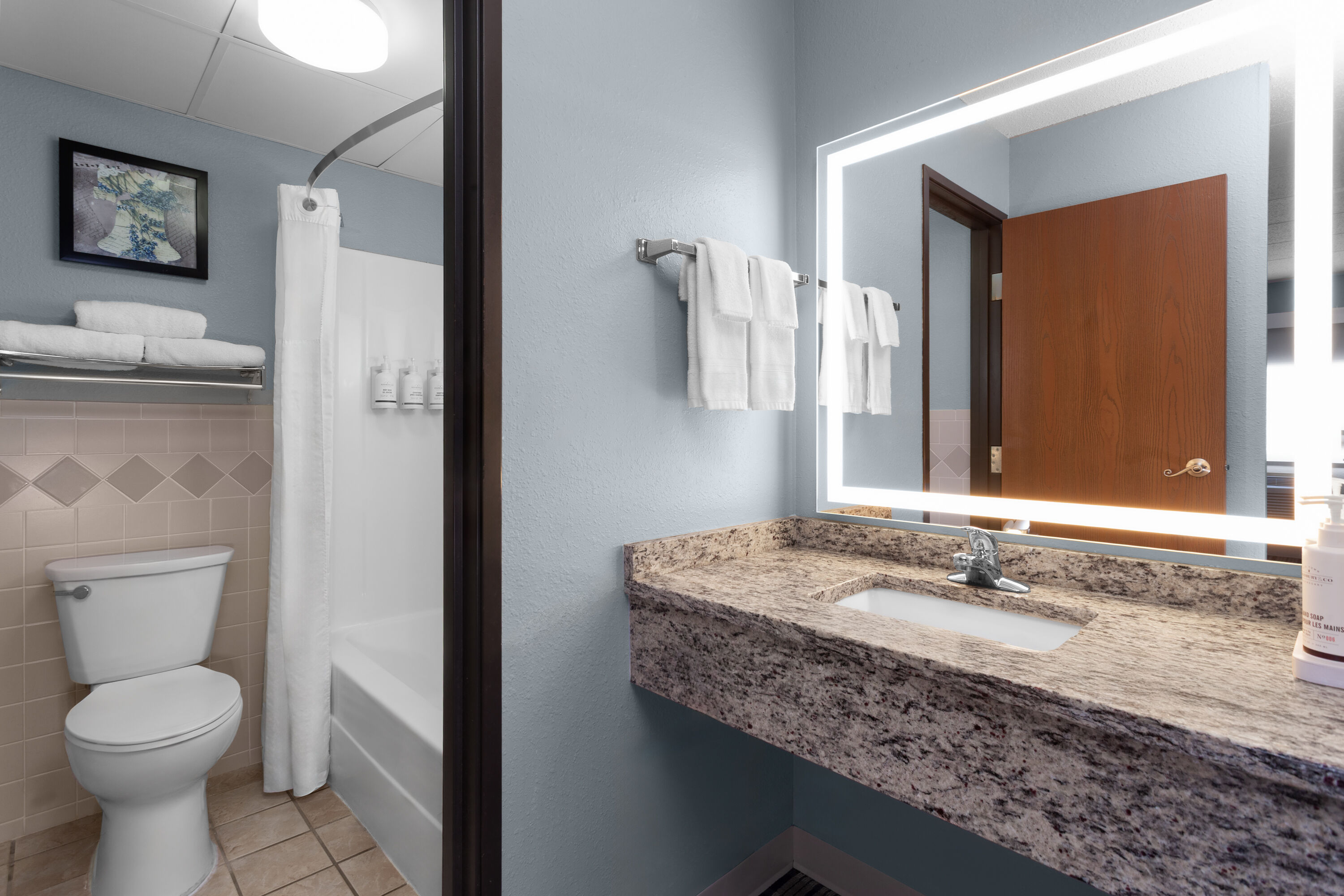 Guest room bath at the AmericInn by Wyndham Austin in Austin, Minnesota