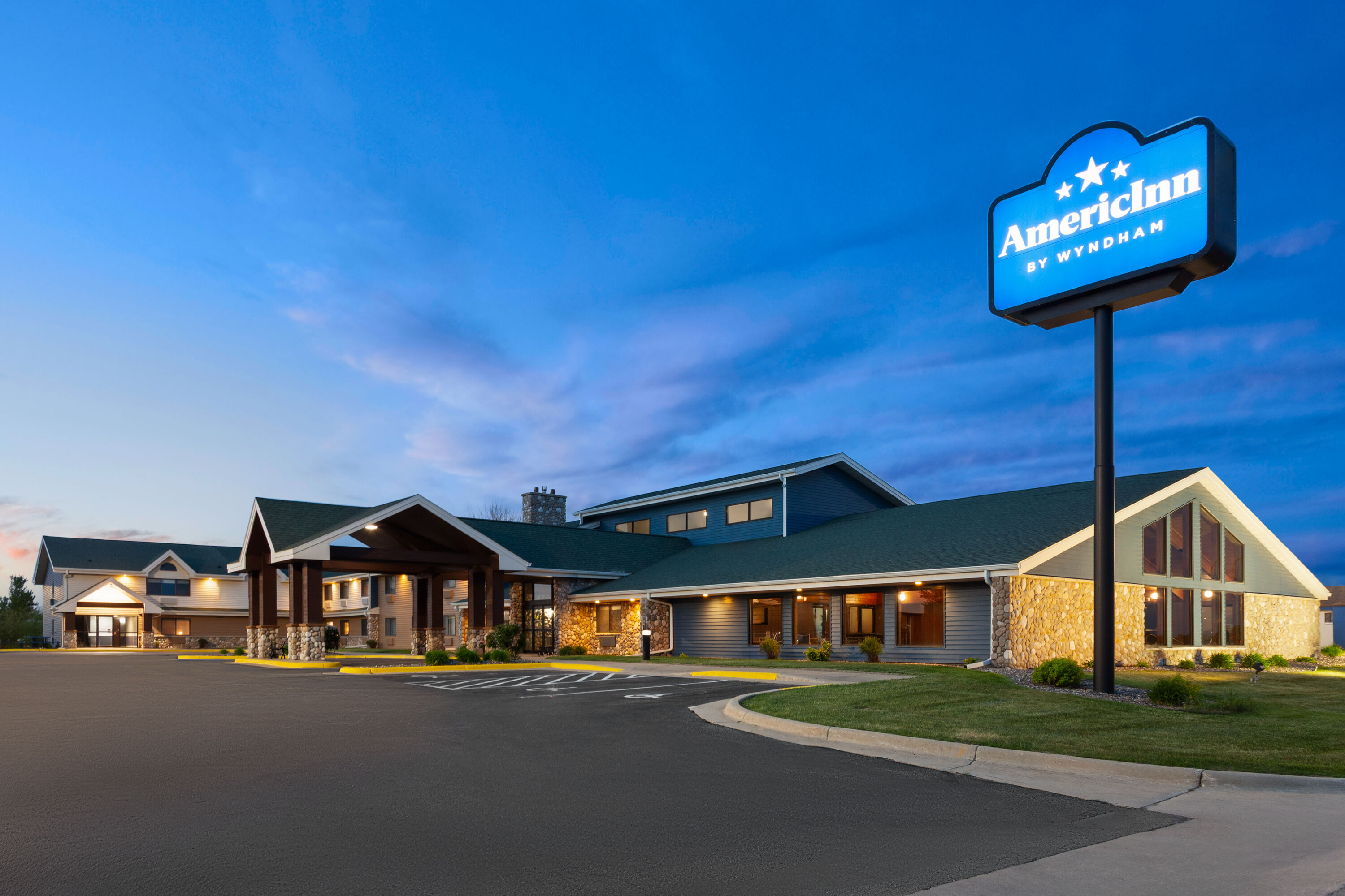Exterior Dusk Image of AmericInn by Wyndham Austin hotel in Austin, Minnesota