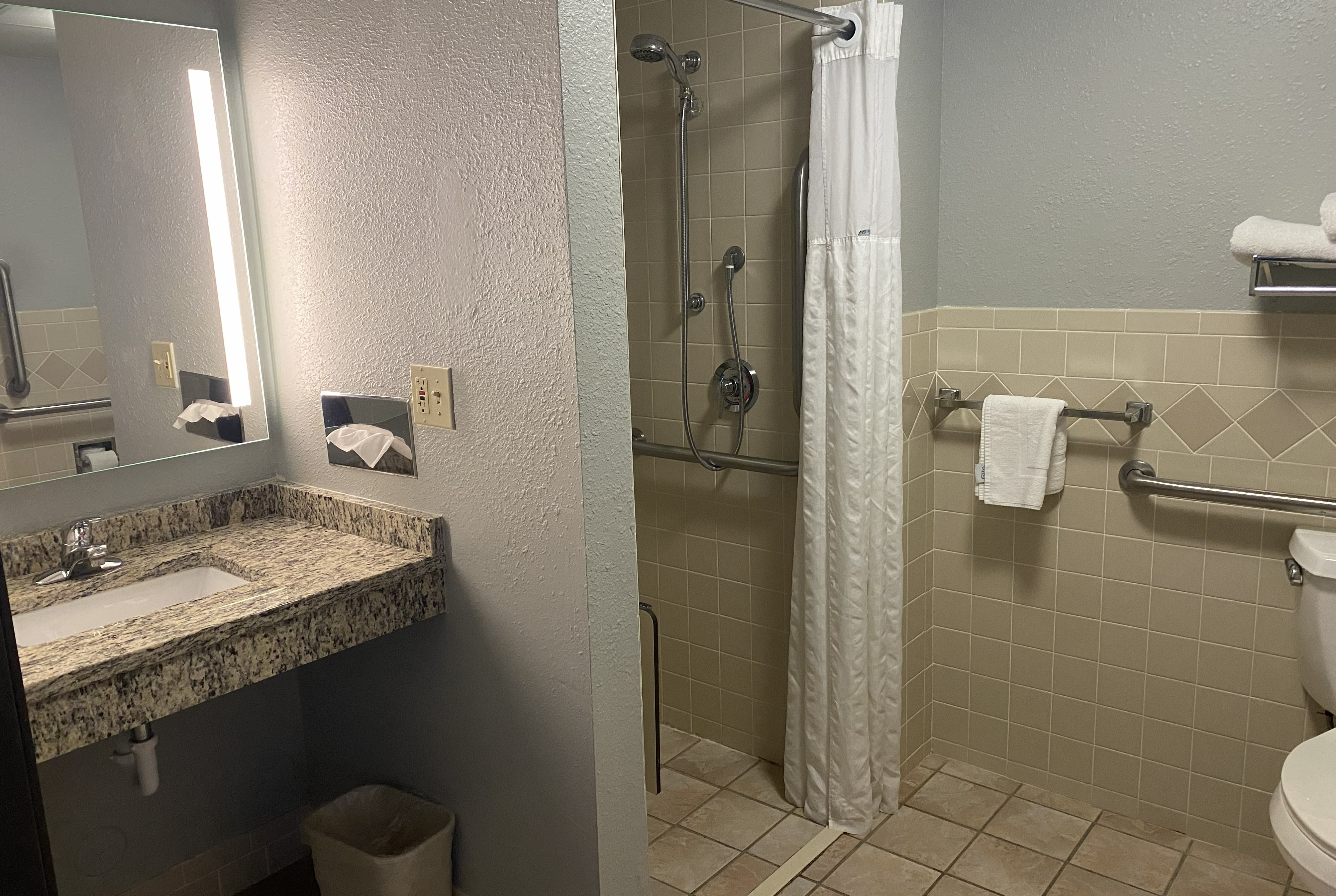 Guest room bath at the AmericInn by Wyndham Austin in Austin, Minnesota