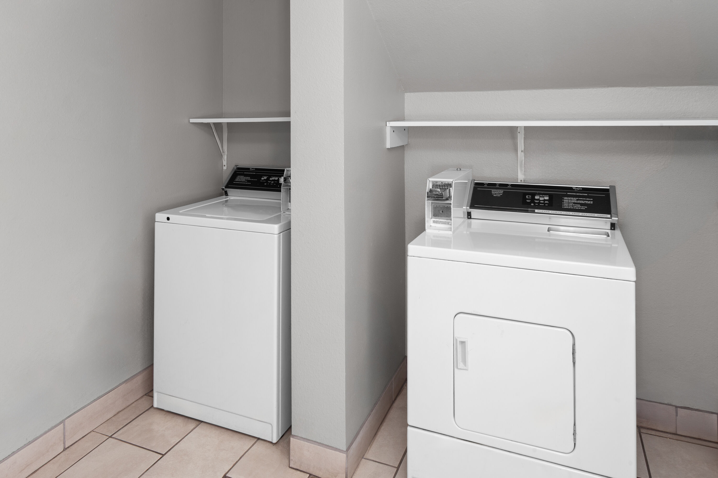 Laundry facilities at AmericInn by Wyndham Austin in Austin, Minnesota