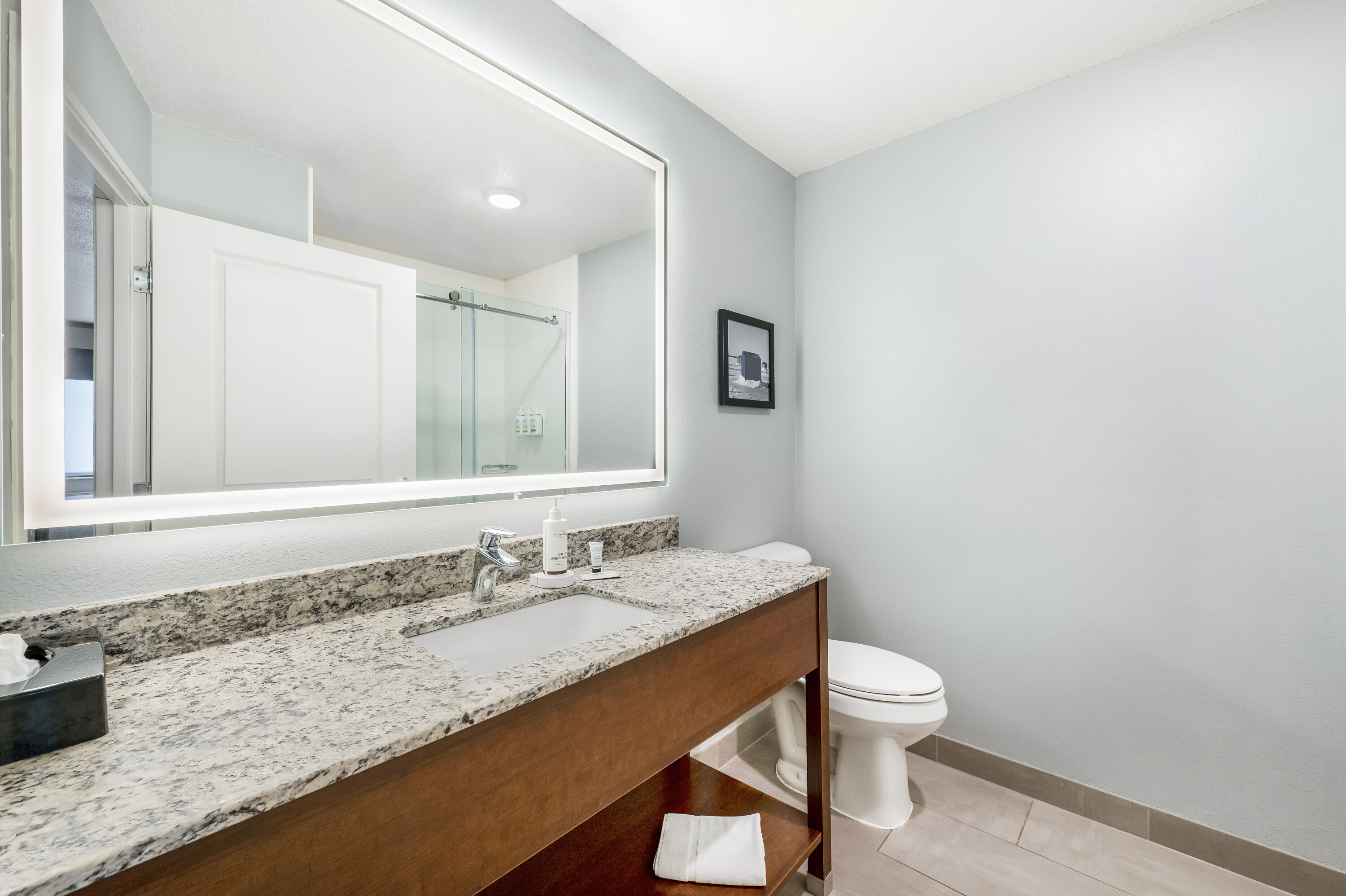 Guest room bath at the AmericInn by Wyndham, Baudette in Baudette, Minnesota