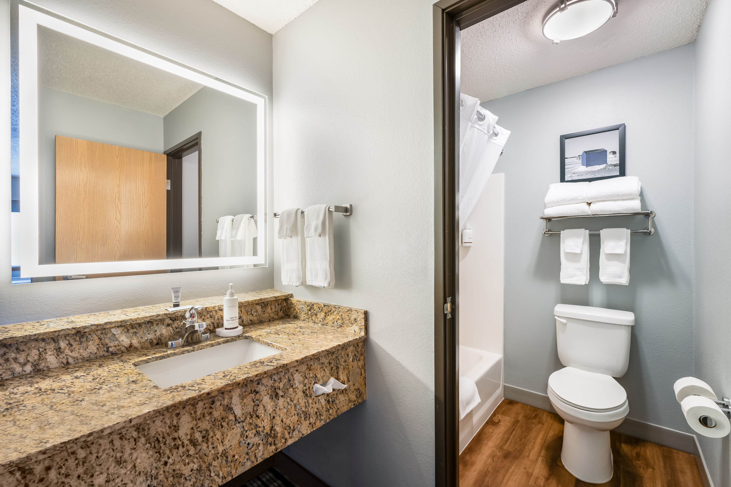 Guest room bath at the AmericInn by Wyndham, Baudette in Baudette, Minnesota