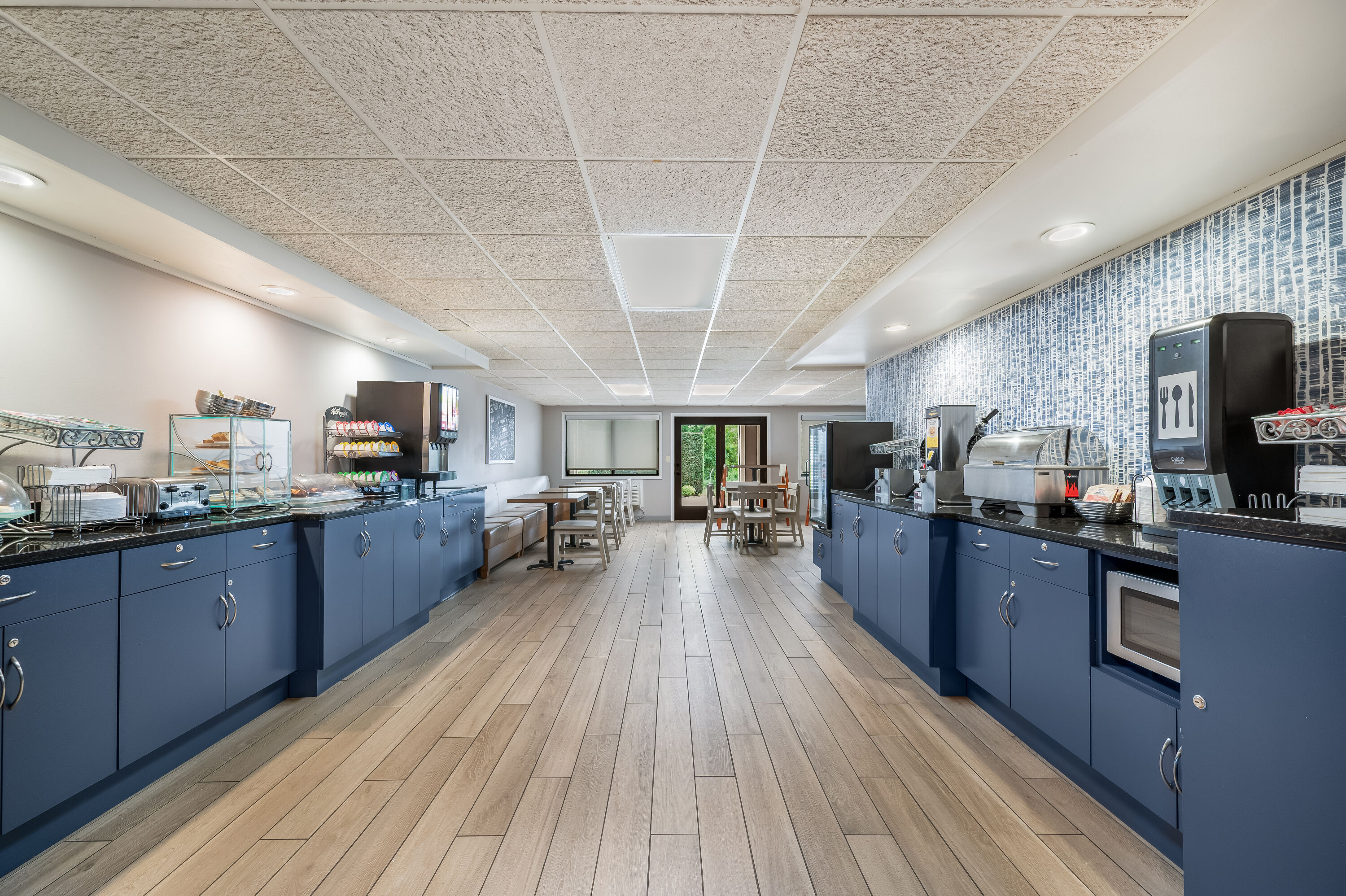 AmericInn by Wyndham, Baudette restaurant breakfast area with seating in Baudette, Minnesota
