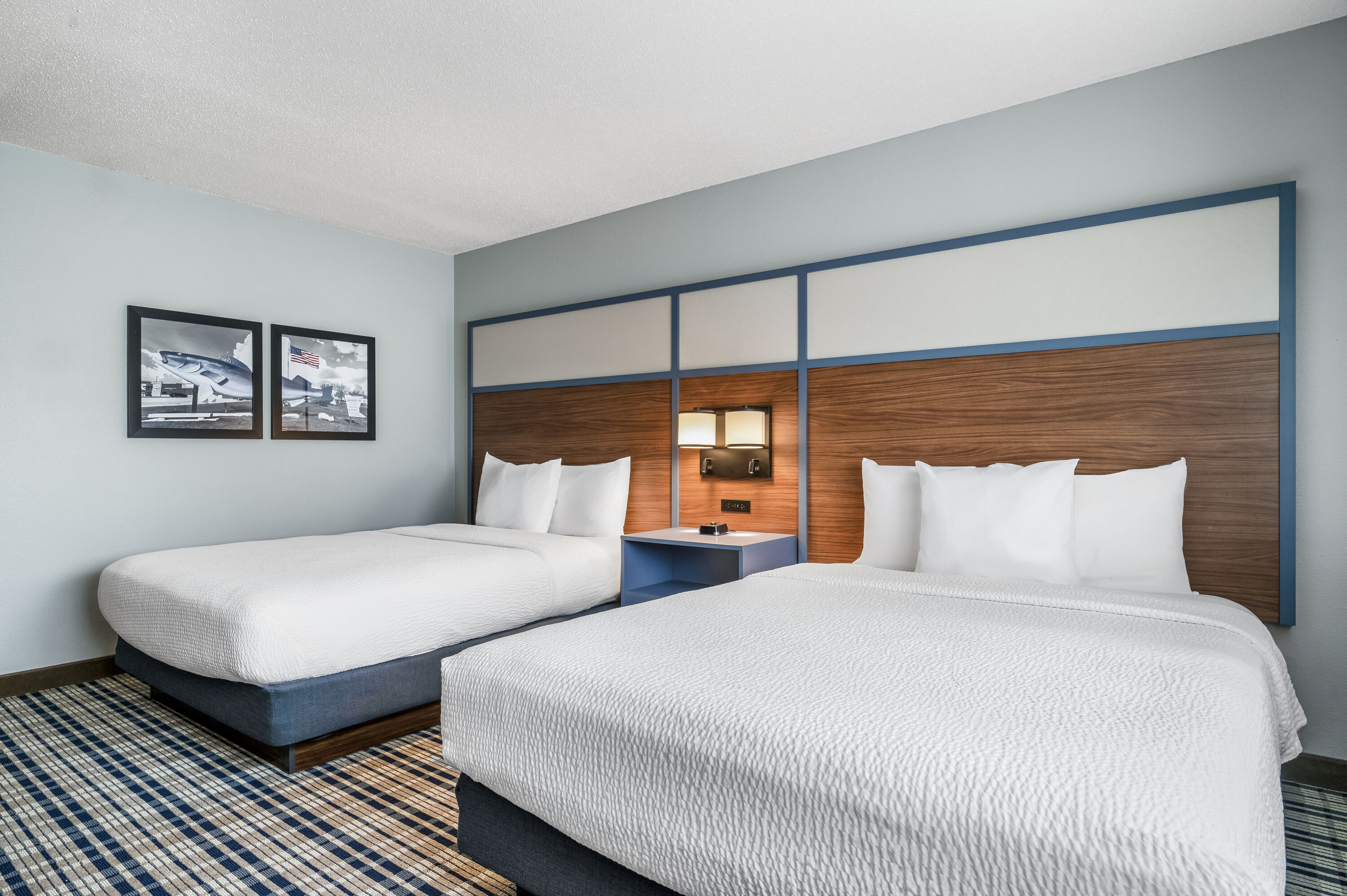 Queen bed guest room at the AmericInn by Wyndham, Baudette in Baudette, Minnesota